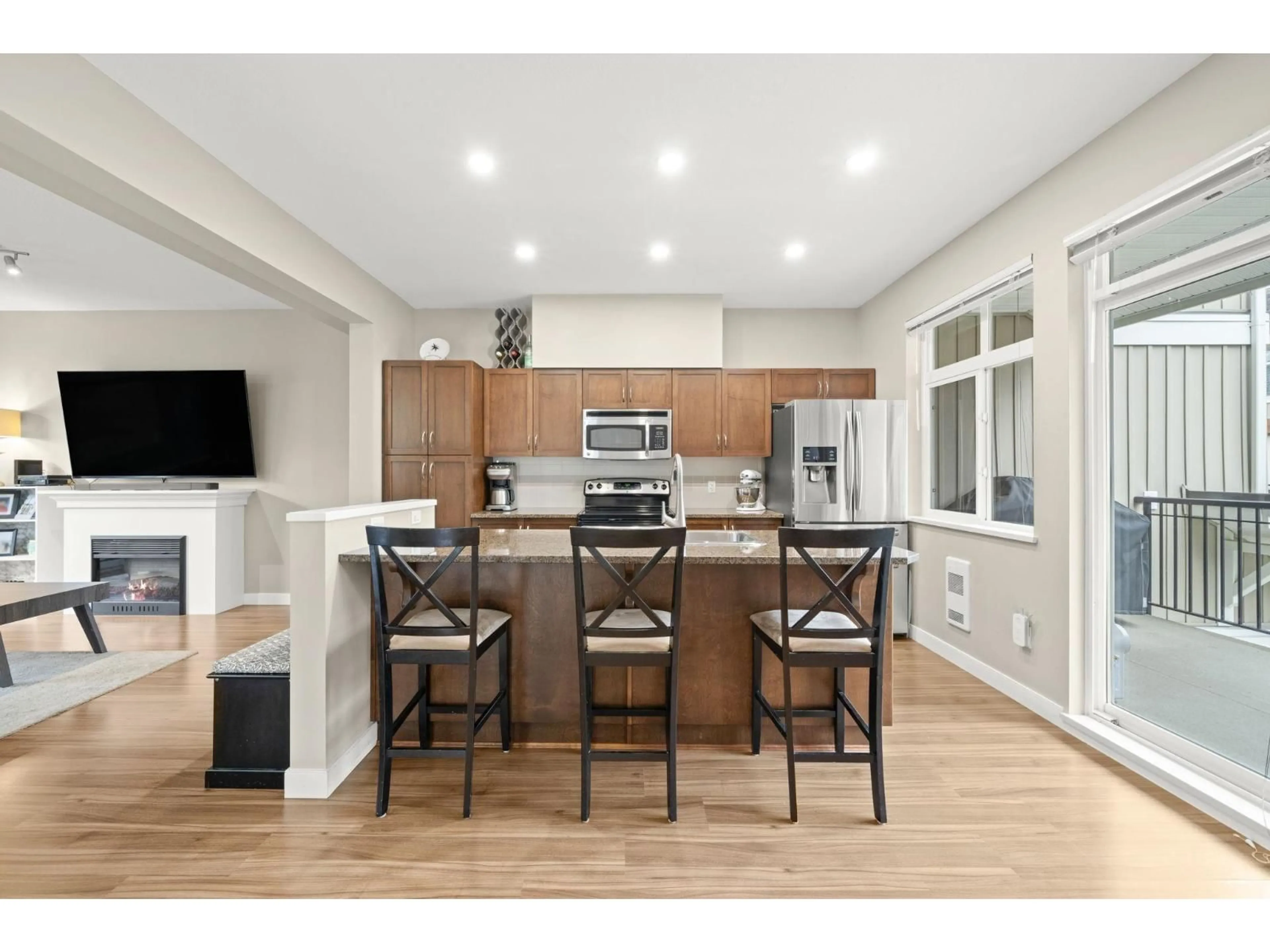 Open concept kitchen, wood/laminate floor for 20 - 6036 164 STREET, Surrey British Columbia V3S3Y5