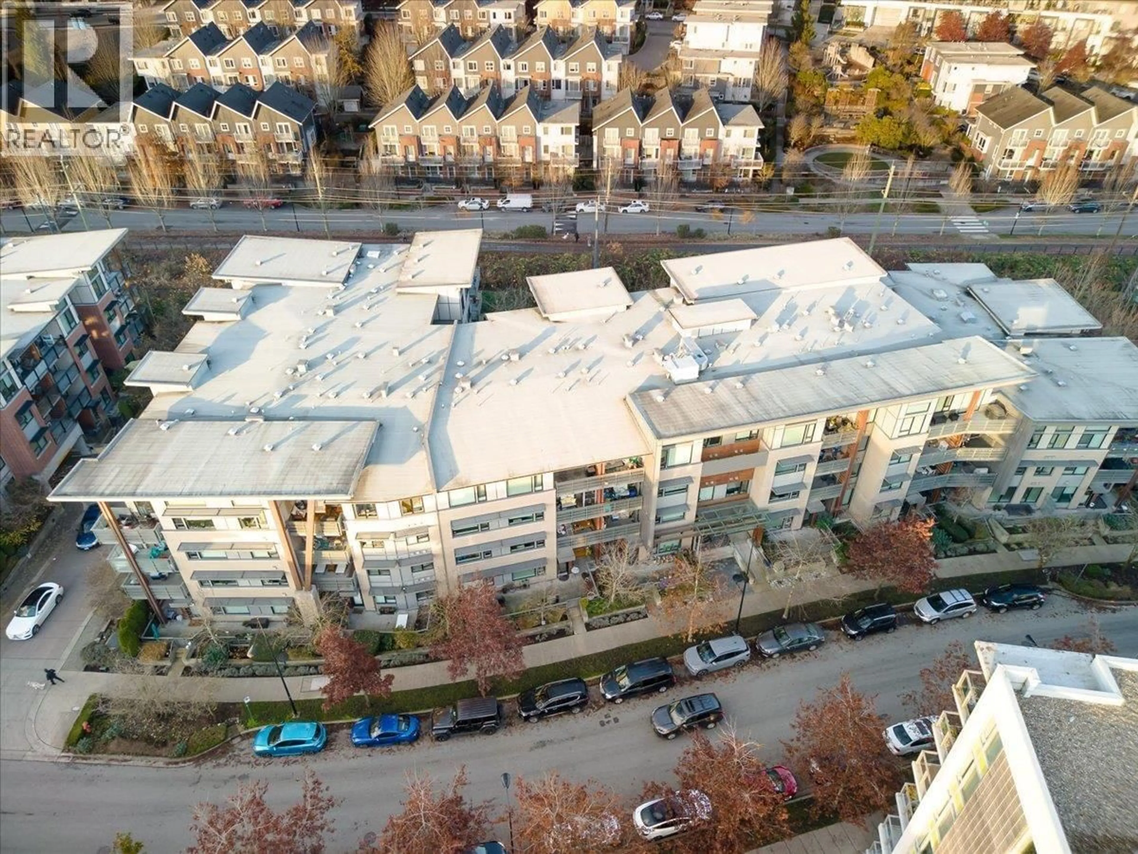 A pic from outside/outdoor area/front of a property/back of a property/a pic from drone, city buildings view from balcony for 412 - 3163 RIVERWALK AVENUE, Vancouver British Columbia V5S0A8