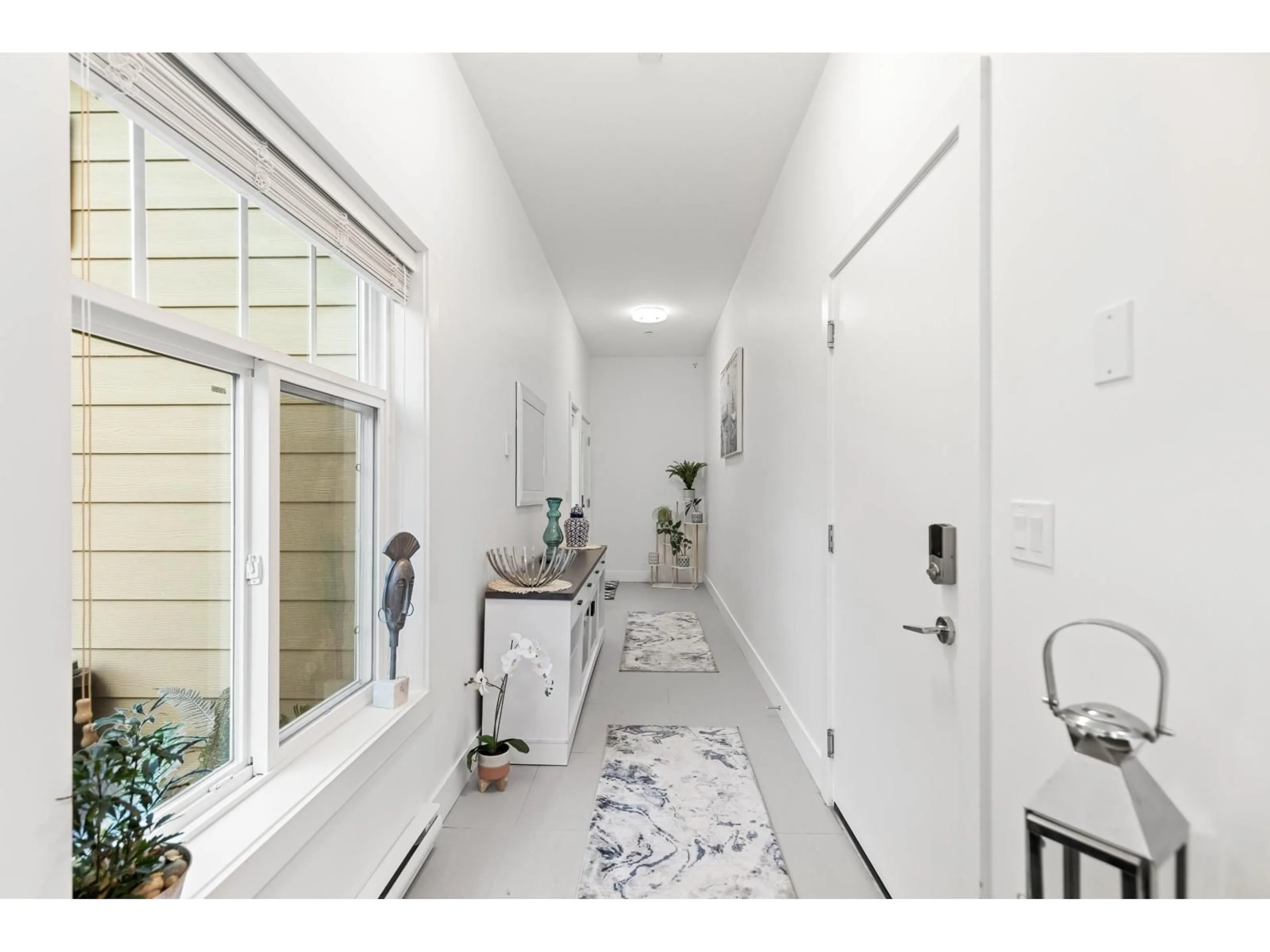 Indoor entryway for 15 - 20901 83 AVENUE, Langley British Columbia V2Y0W8