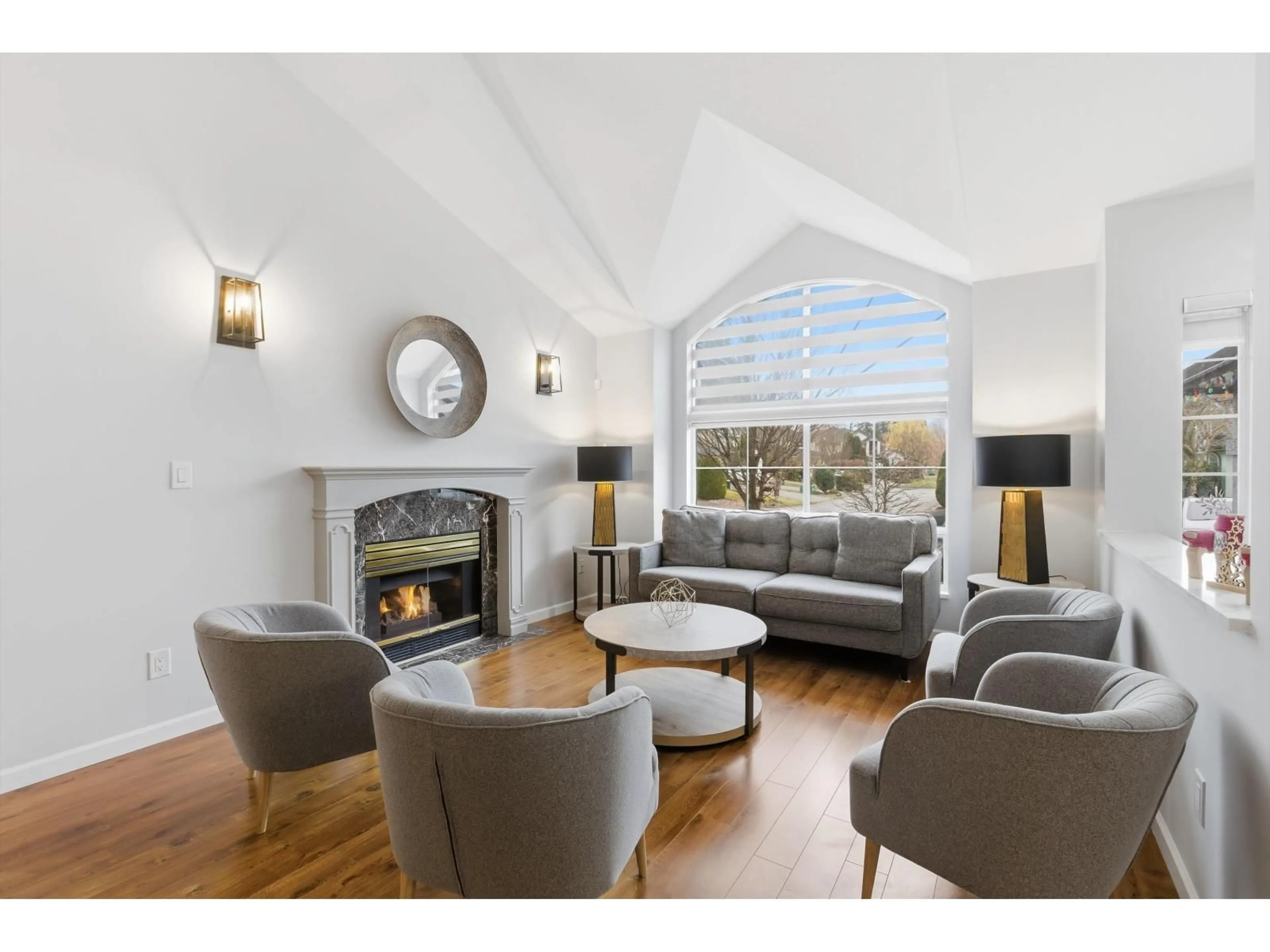 Living room with furniture, wood/laminate floor for 16088 108A AVENUE, Surrey British Columbia V4N1P1