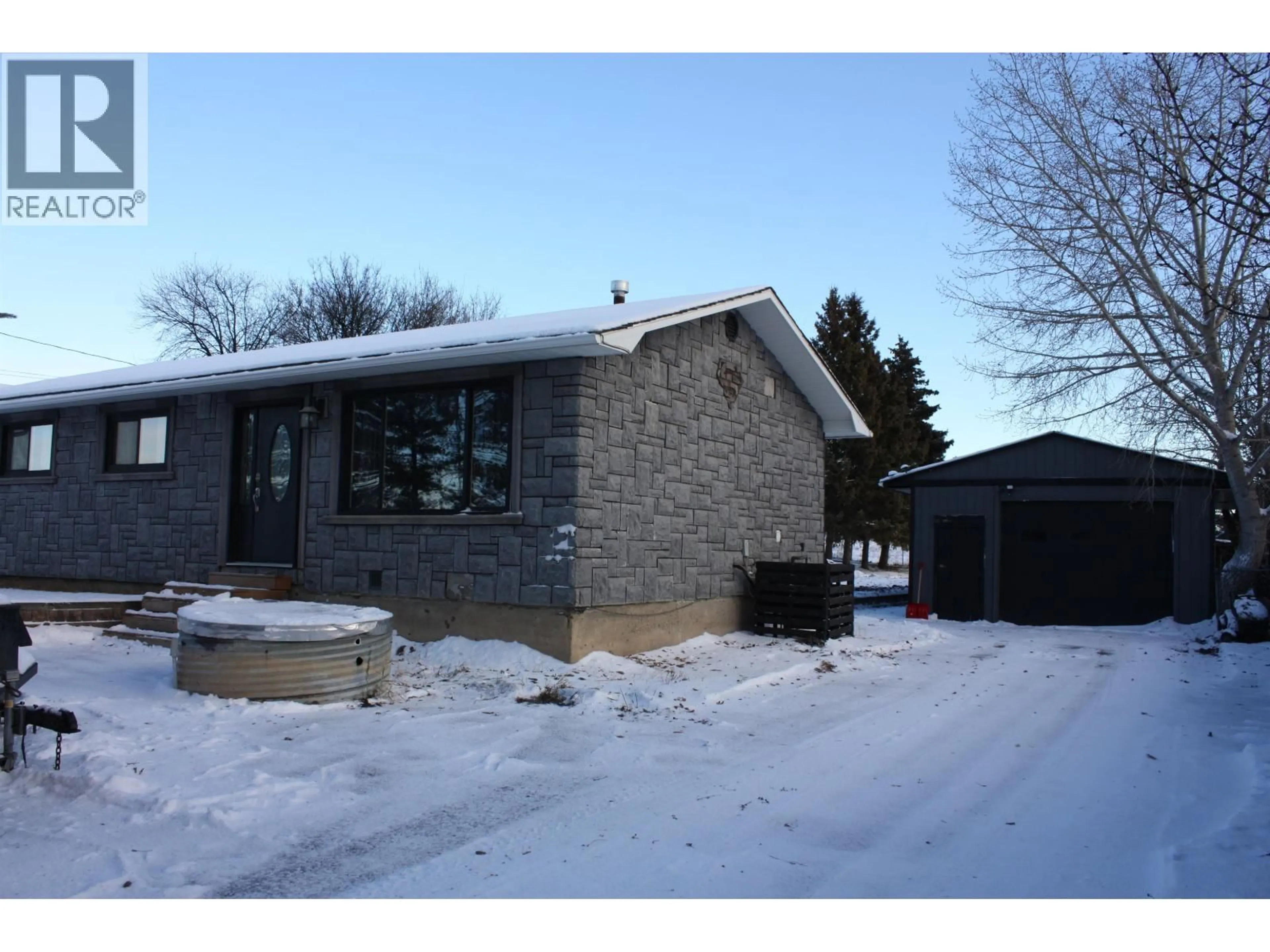 Home with brick exterior material, street for 8824 PINE ROAD, Fort St. John British Columbia V1J4M7