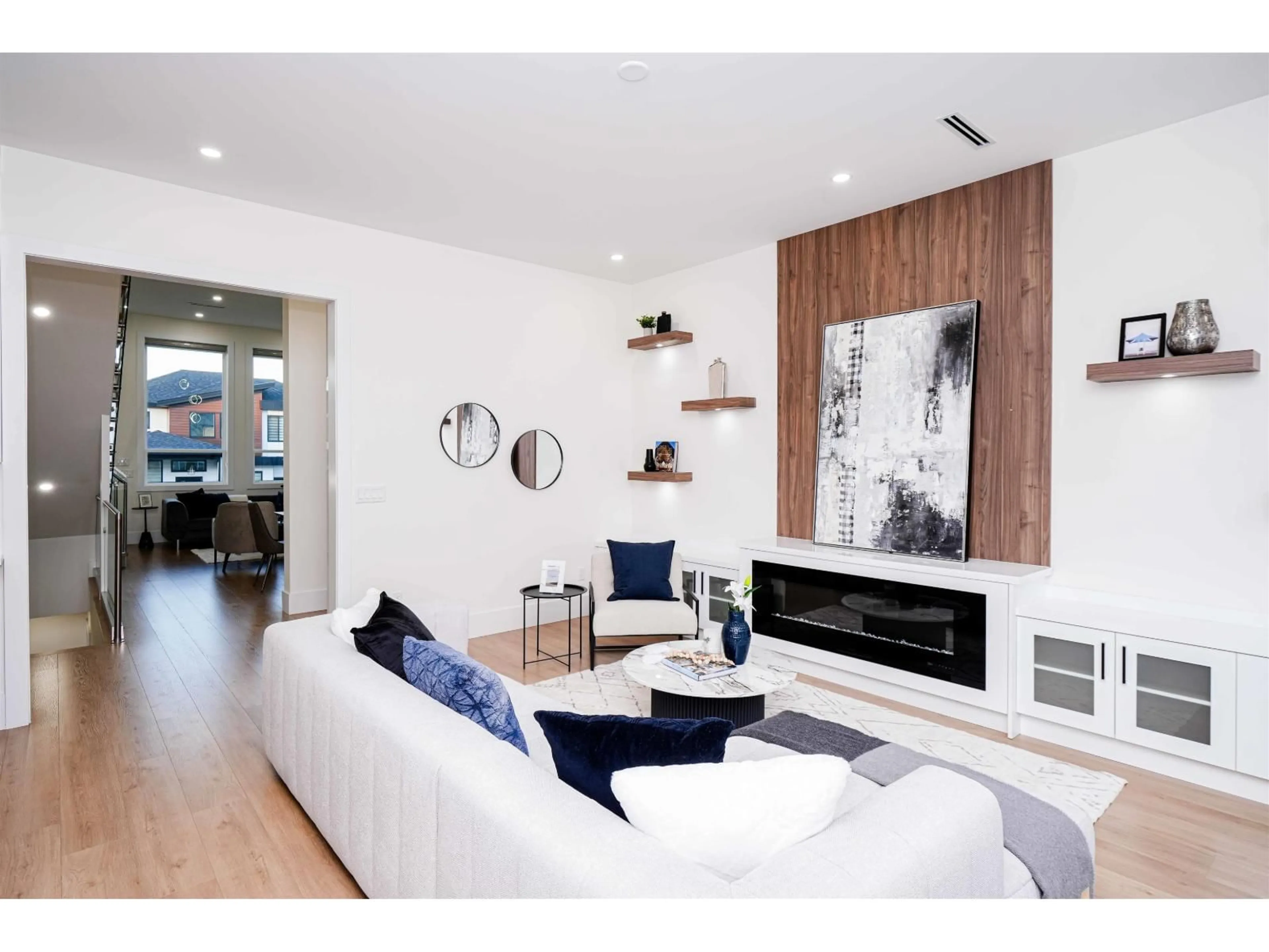 Living room with furniture, wood/laminate floor for 14742 62A AVENUE, Surrey British Columbia V3S2W9