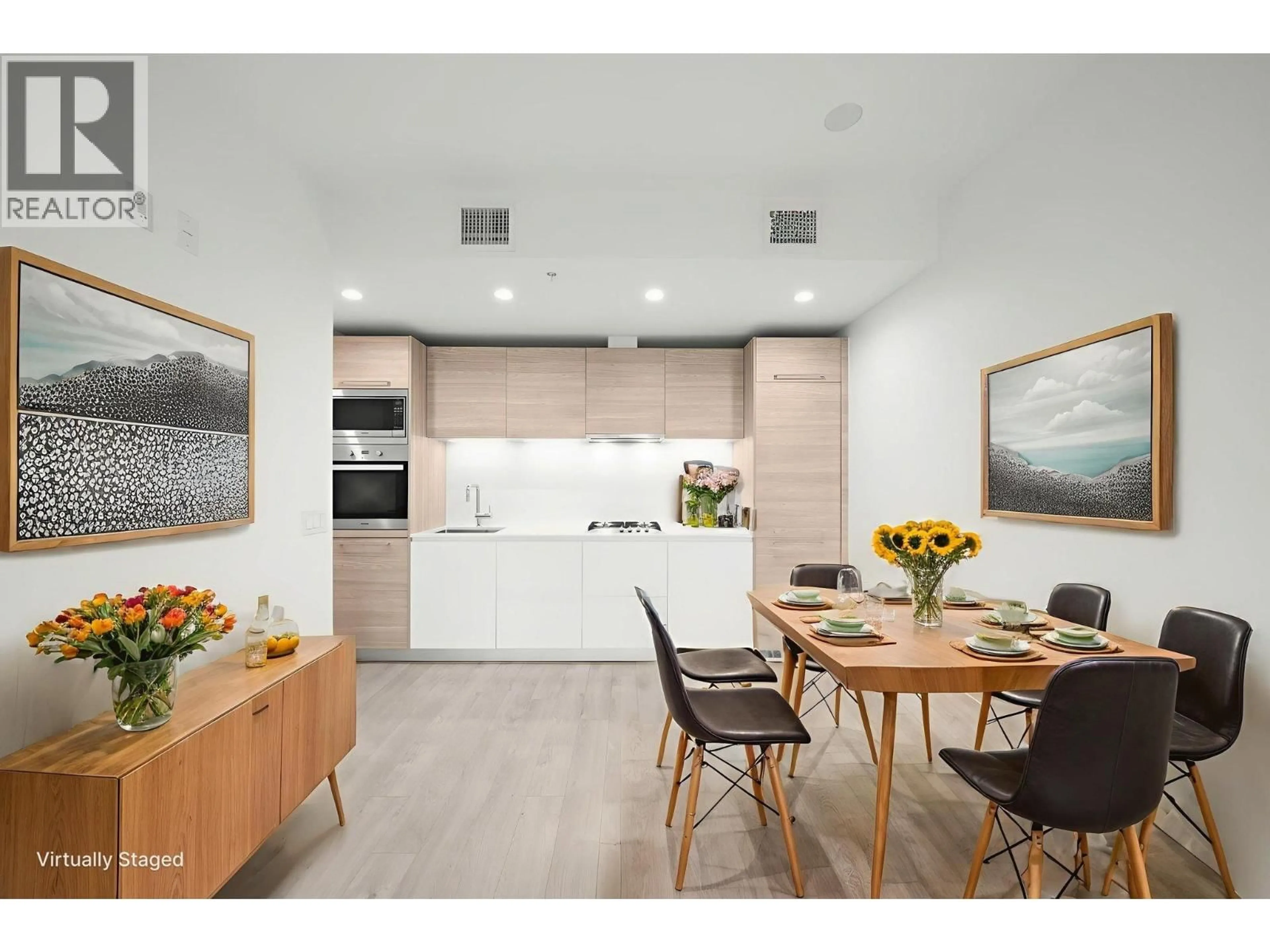 Open concept kitchen, wood/laminate floor for 301 - 523 KING EDWARD AVENUE, Vancouver British Columbia V5Z0J3