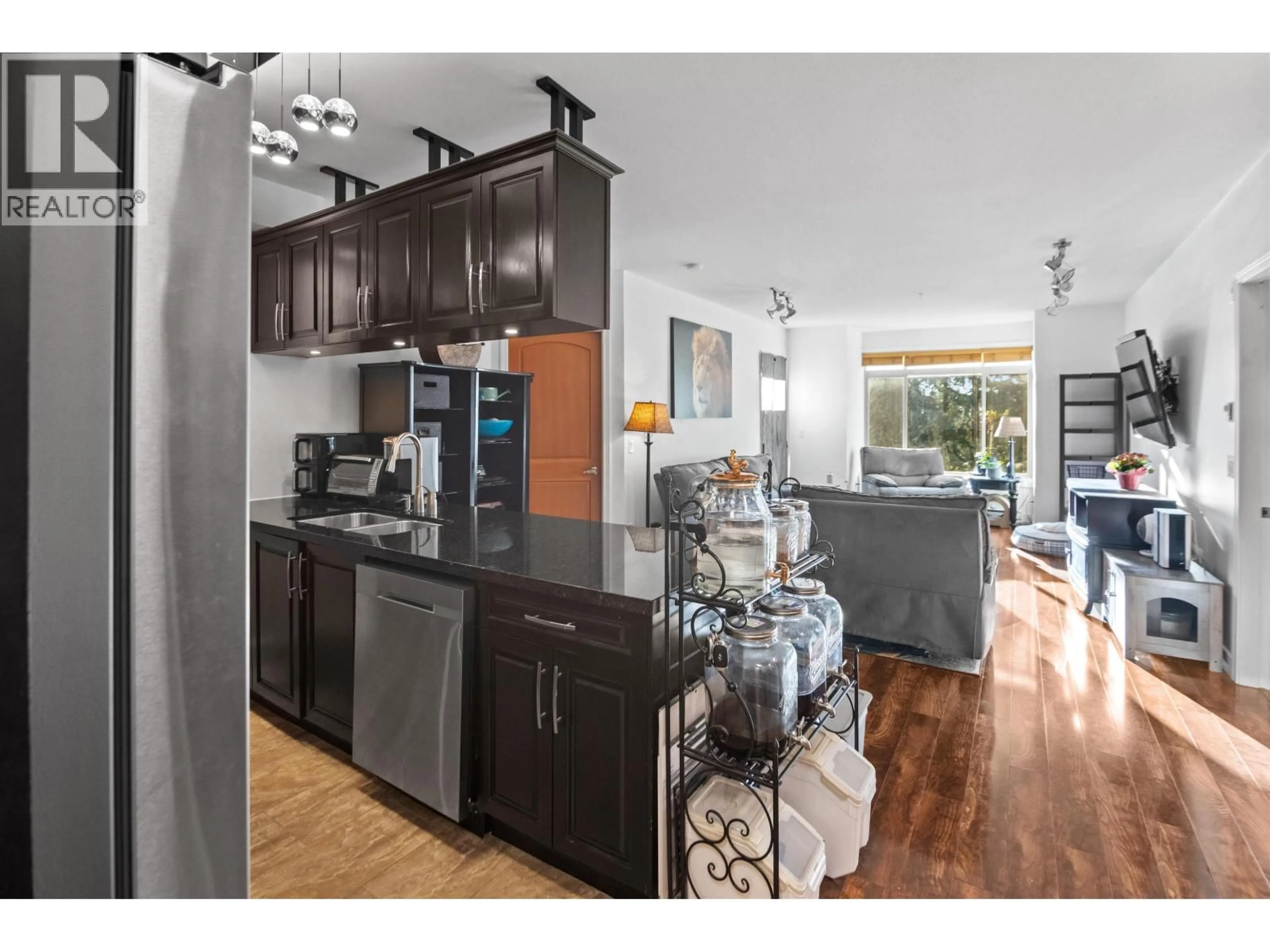 Open concept kitchen, wood/laminate floor for 301 - 11887 BURNETT STREET, Maple Ridge British Columbia V2X6P6
