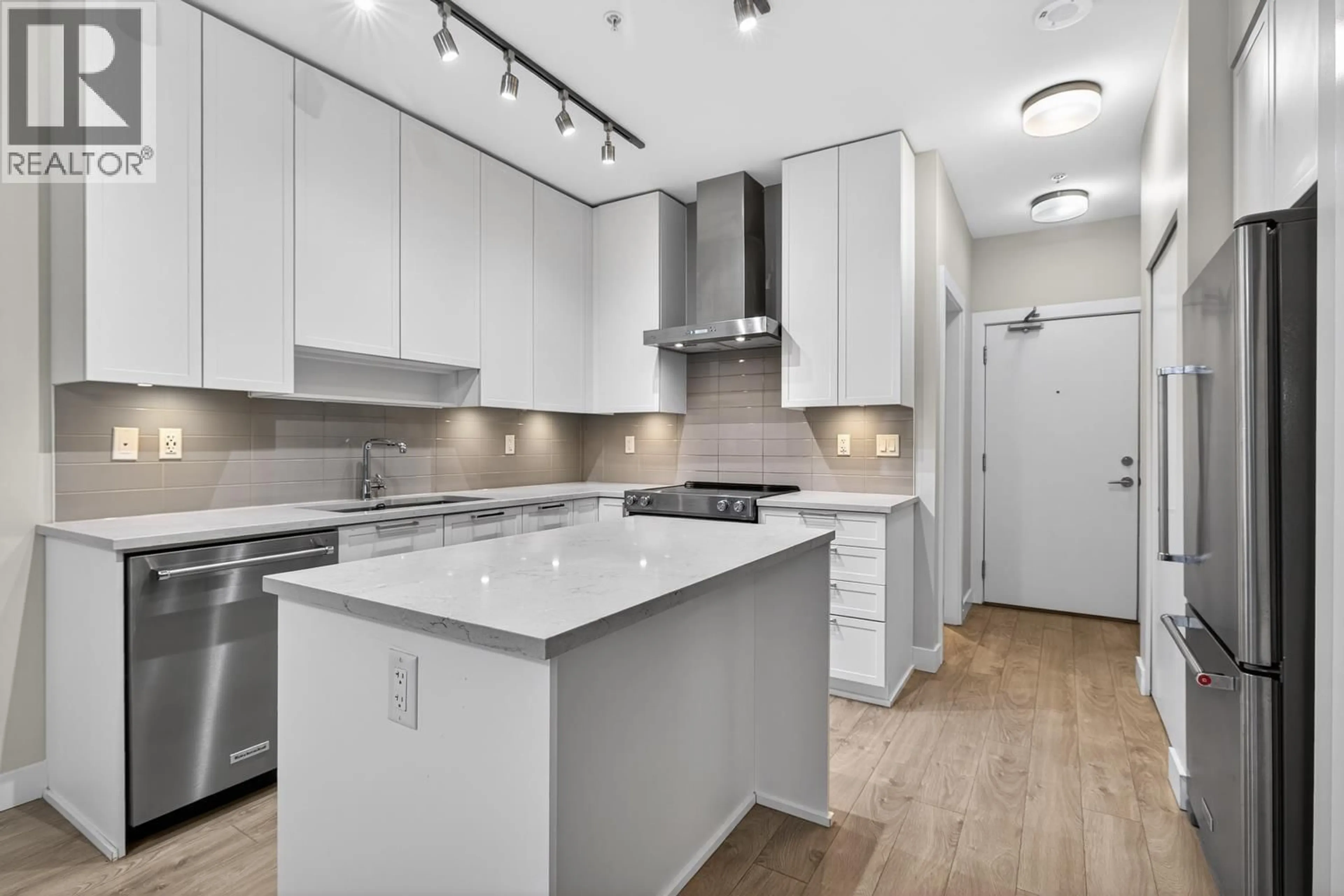 Open concept kitchen, unknown for 303 - 1728 GILMORE AVENUE, Burnaby British Columbia V5C0L3