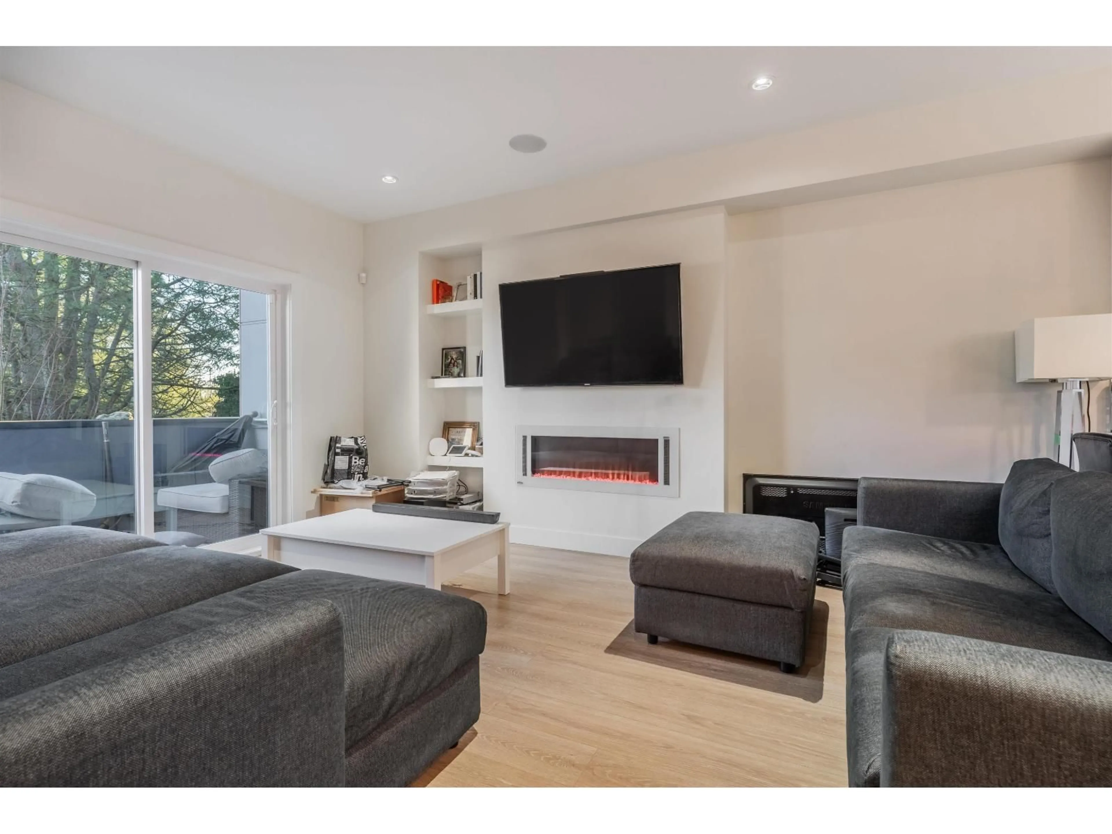 Living room with furniture, wood/laminate floor for 13 - 1670 160 STREET, Surrey British Columbia V4A0C6