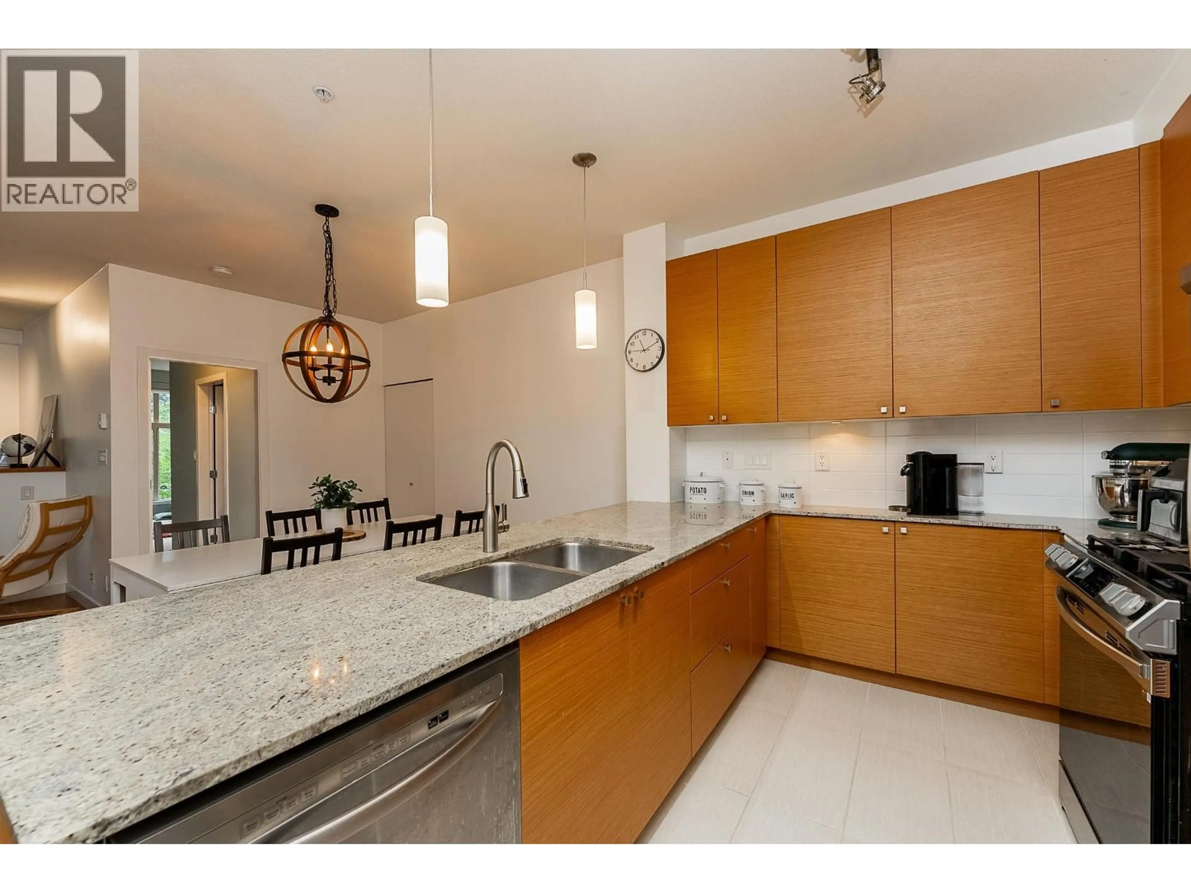 Open concept kitchen, ceramic/tile floor for 310 - 101 MORRISSEY ROAD, Port Moody British Columbia V3H0E6