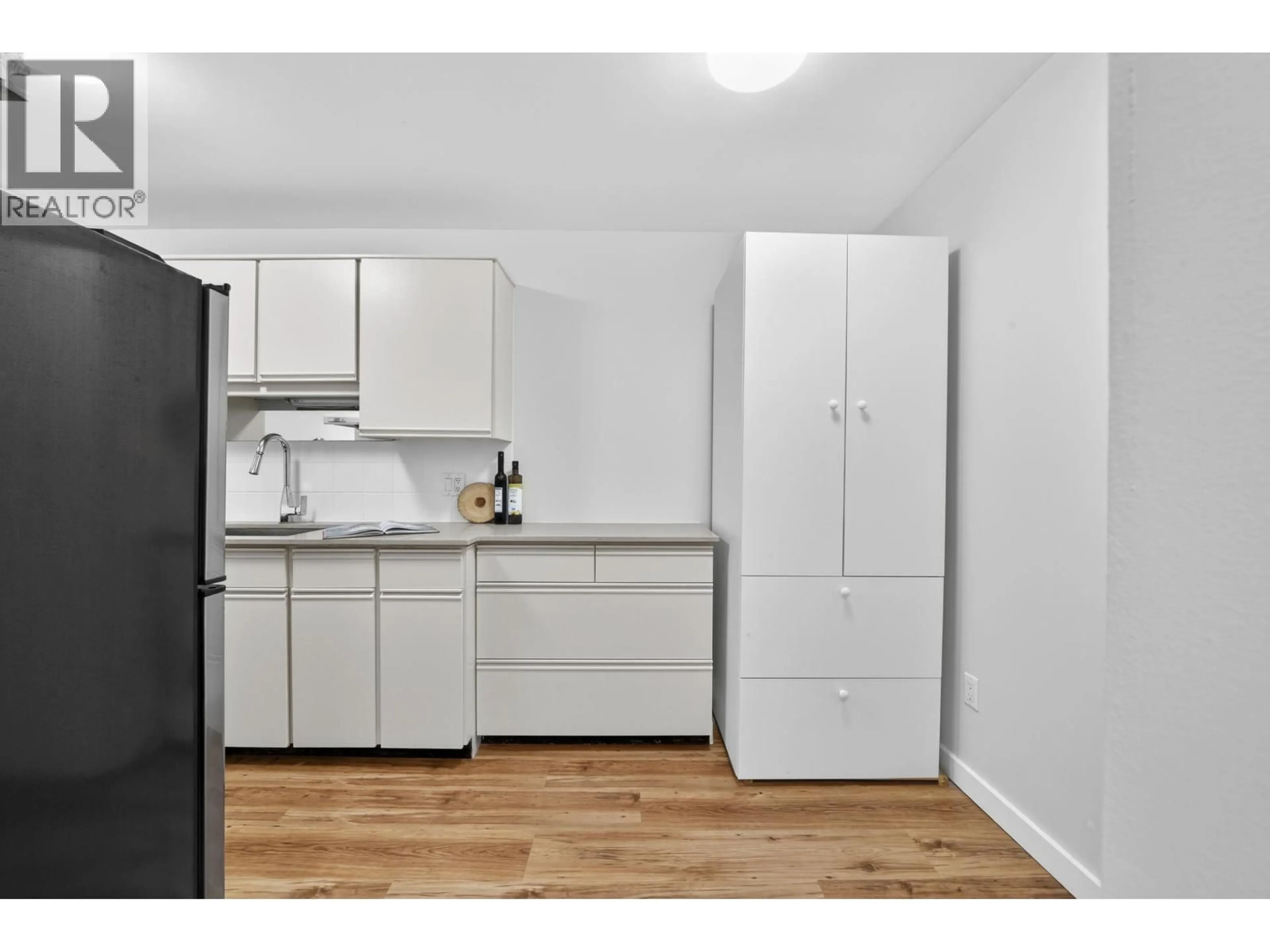 Standard kitchen, wood/laminate floor for 206 - 9202 HORNE STREET, Burnaby British Columbia V3N4K2