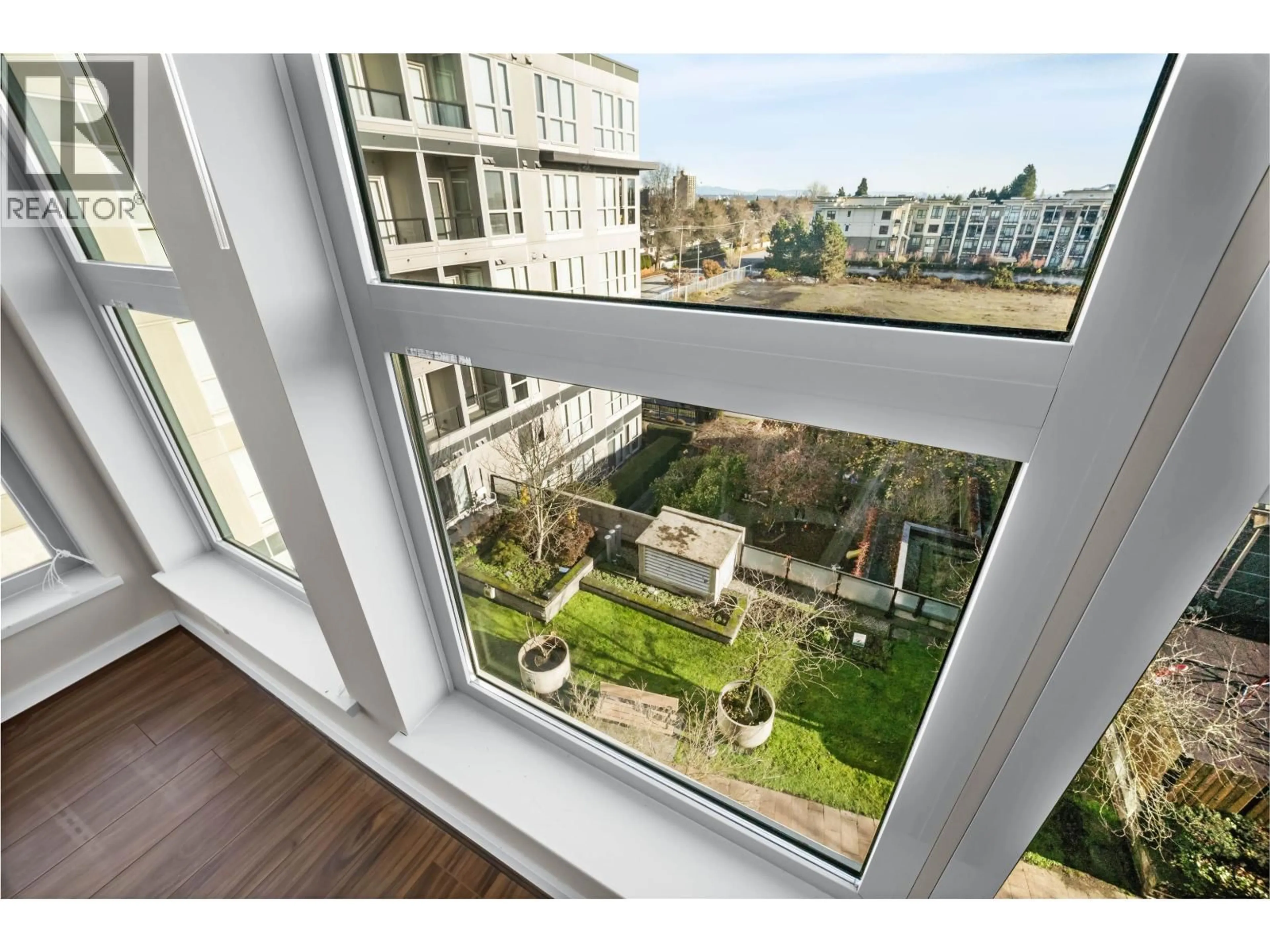 Balcony in the apartment, city buildings view from balcony for 672 - 4099 STOLBERG STREET, Richmond British Columbia V6X0J4