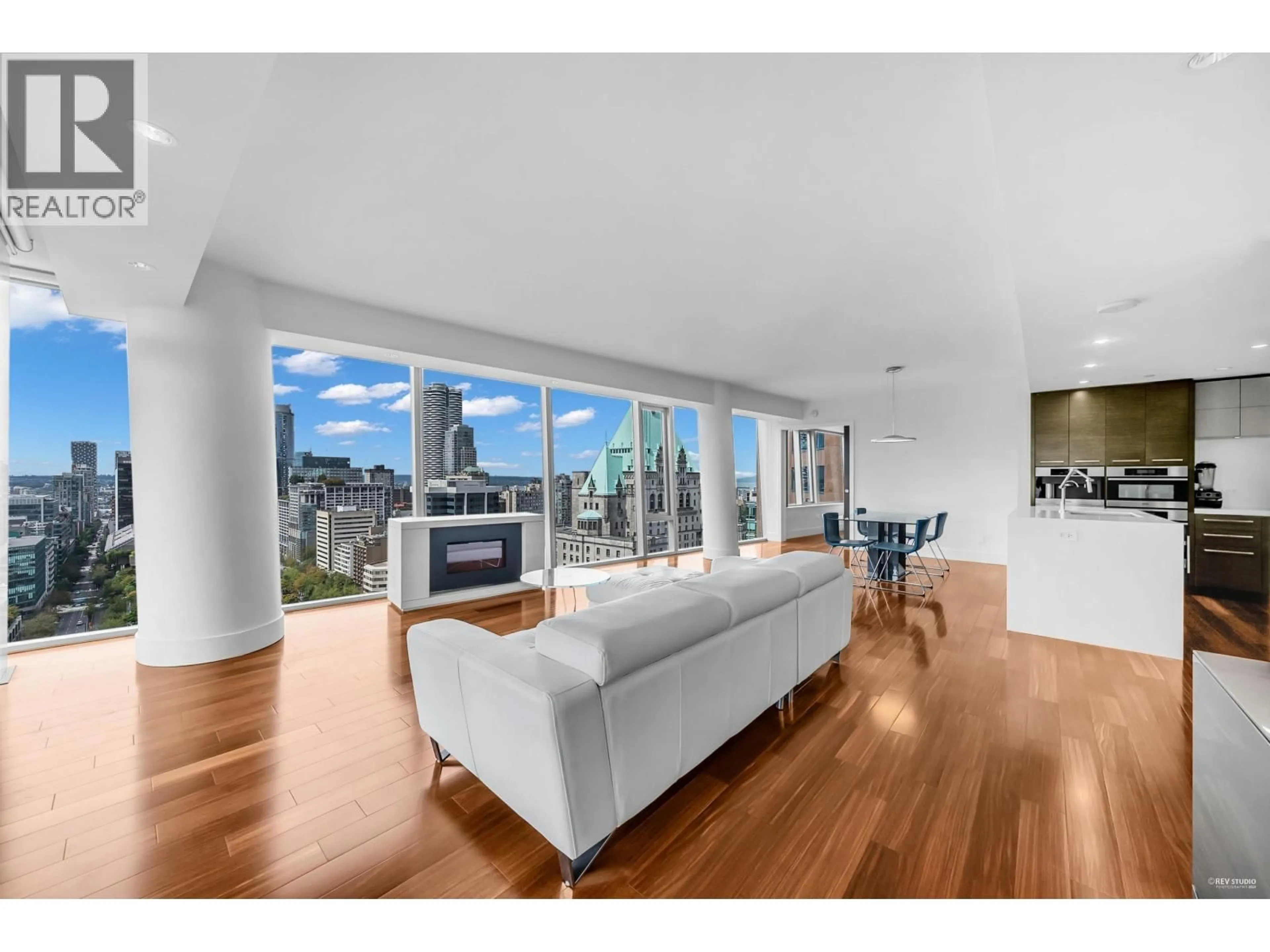 Living room with furniture, wood/laminate floor for 2405 - 667 HOWE STREET, Vancouver British Columbia V6C0B5