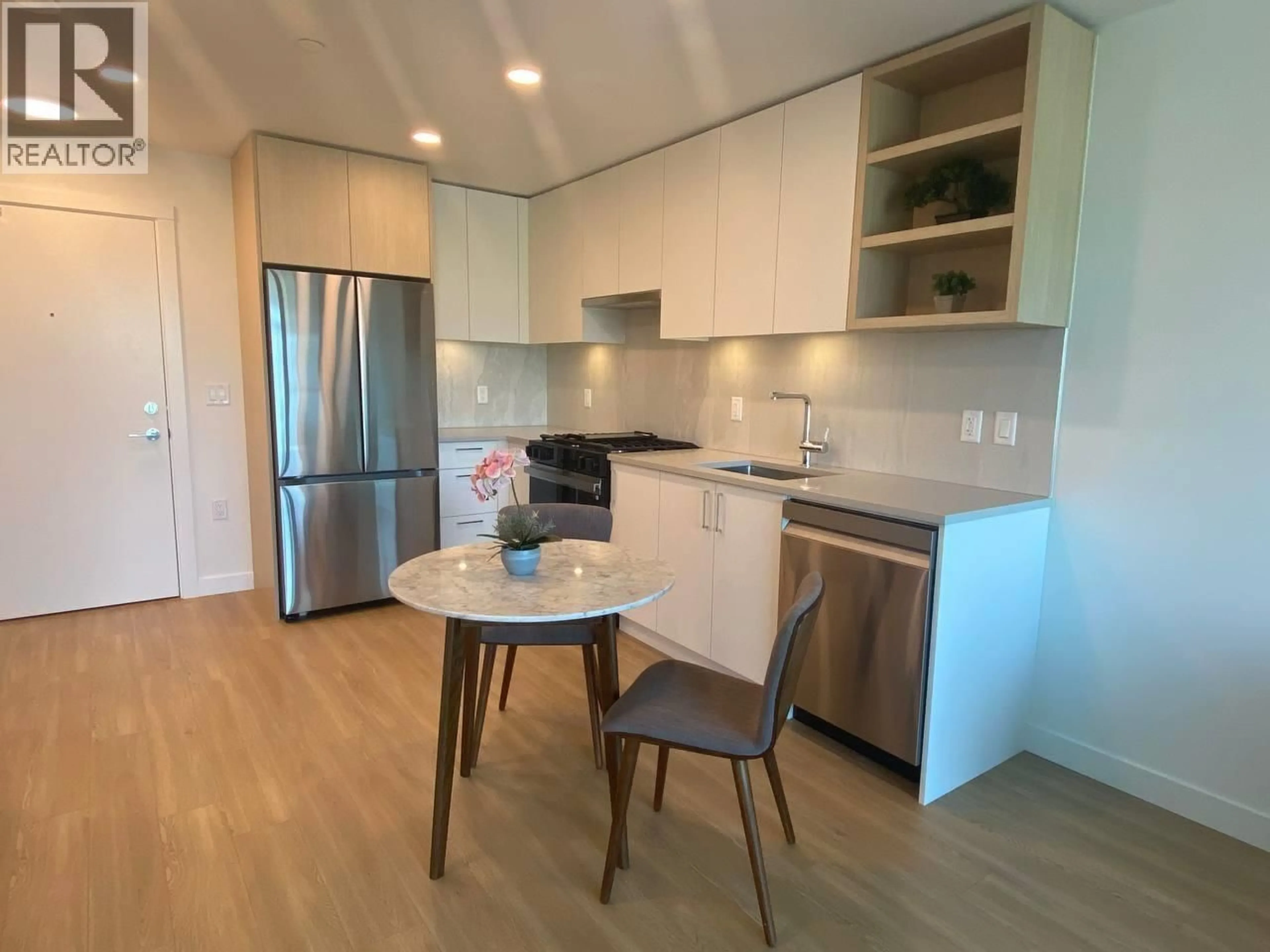 Open concept kitchen, wood/laminate floor for 508 - 723 GROVER AVENUE, Coquitlam British Columbia V3J0N9