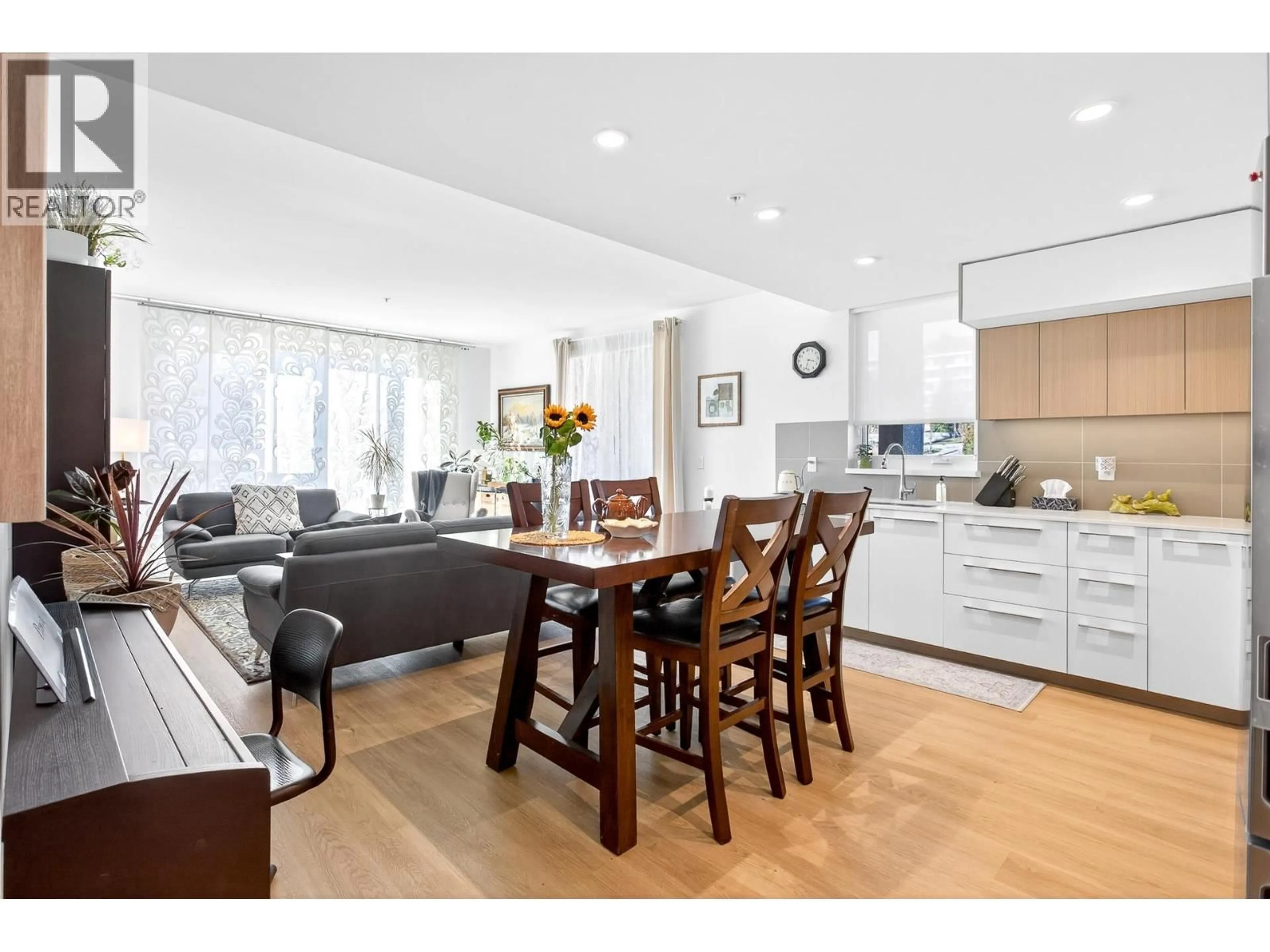 Open concept kitchen, wood/laminate floor for 410 - 9888 UNIVERSITY CRESCENT, Burnaby British Columbia V5A0G4