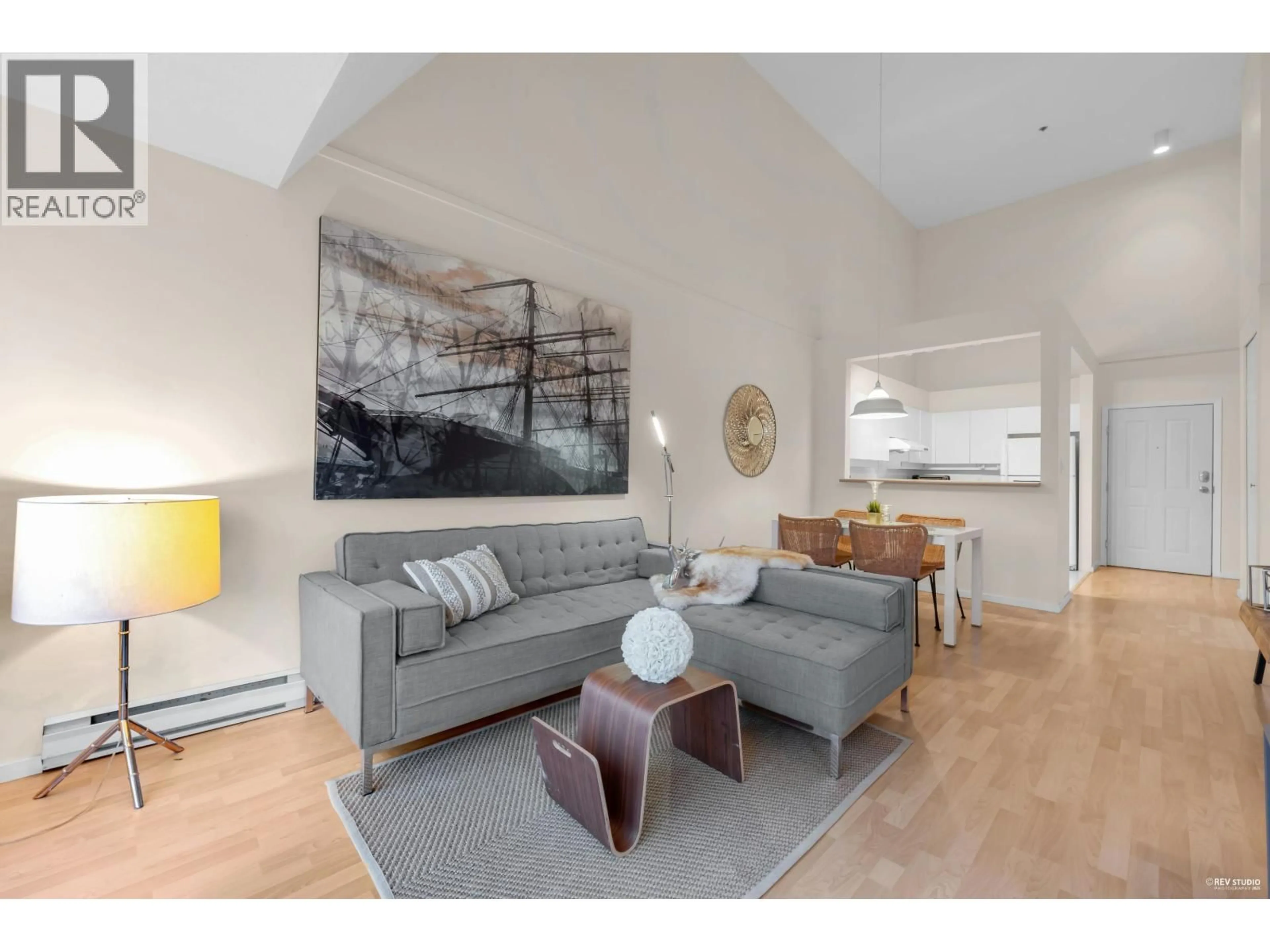 Living room with furniture, wood/laminate floor for 303 - 8660 JONES ROAD, Richmond British Columbia V6Y1L8