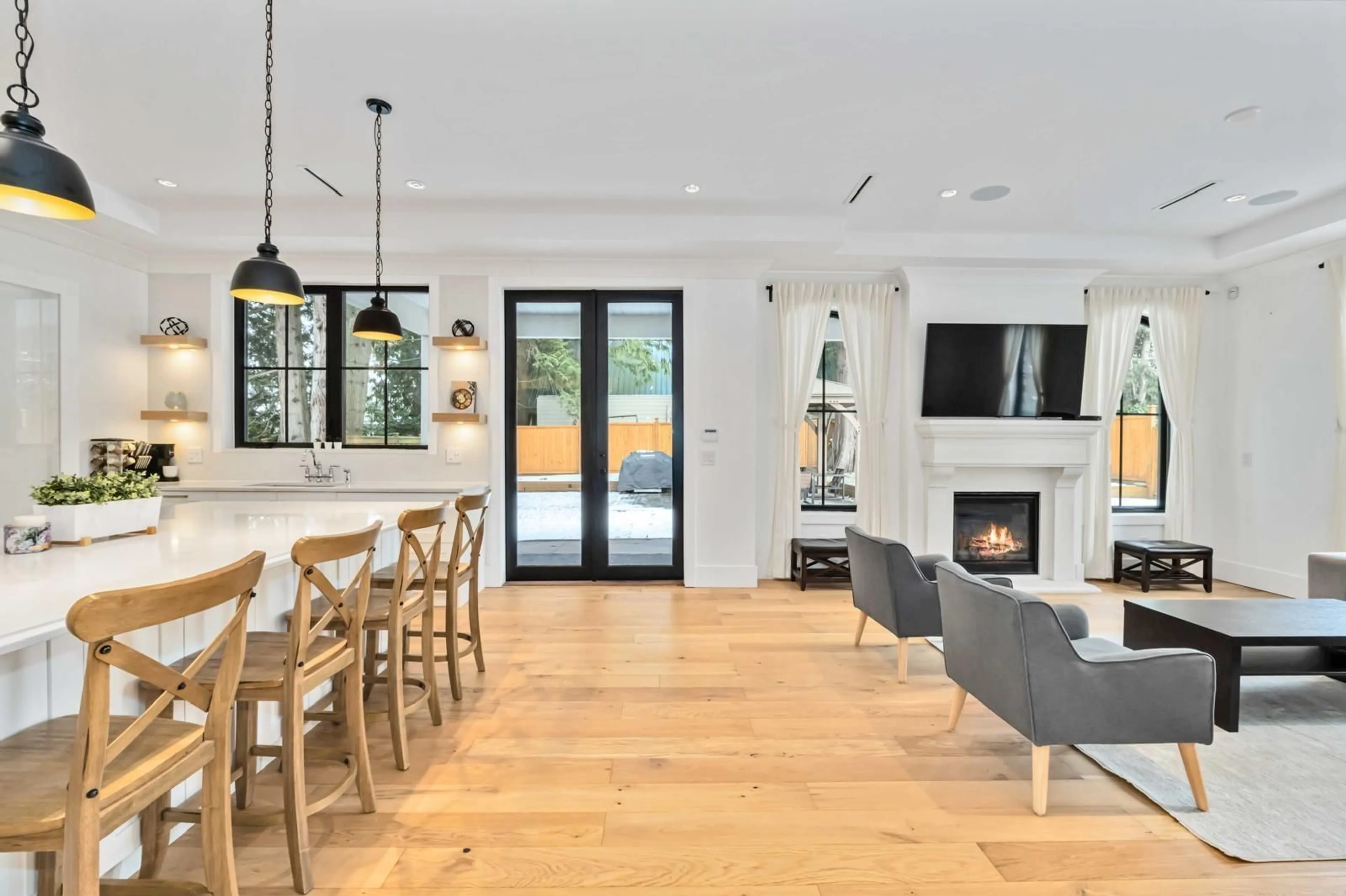 Open concept kitchen, wood/laminate floor for 1577 131 STREET, Surrey British Columbia V4A4B2