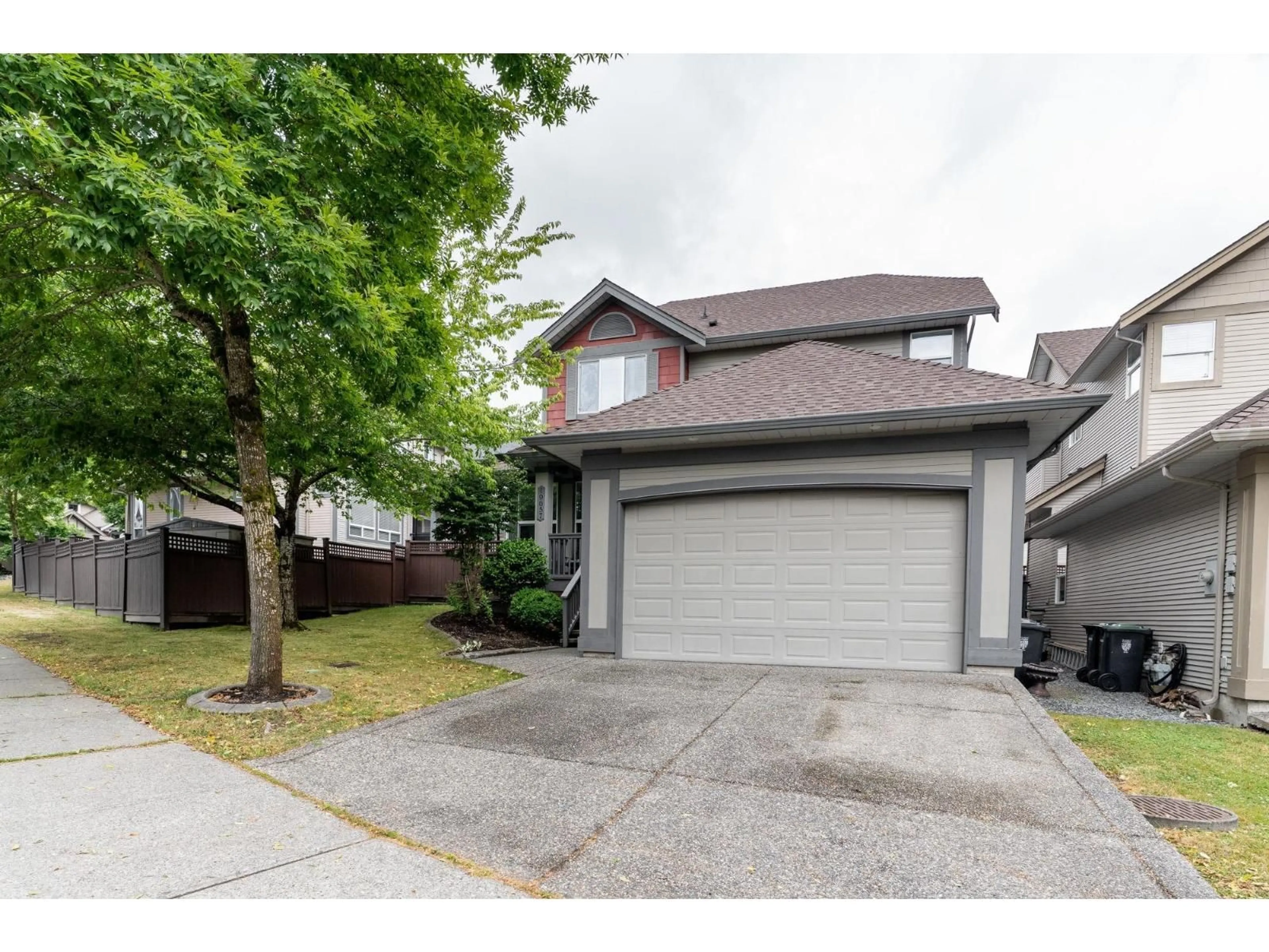 Home with vinyl exterior material, street for 19657 69A AVENUE, Langley British Columbia V2Y3A6
