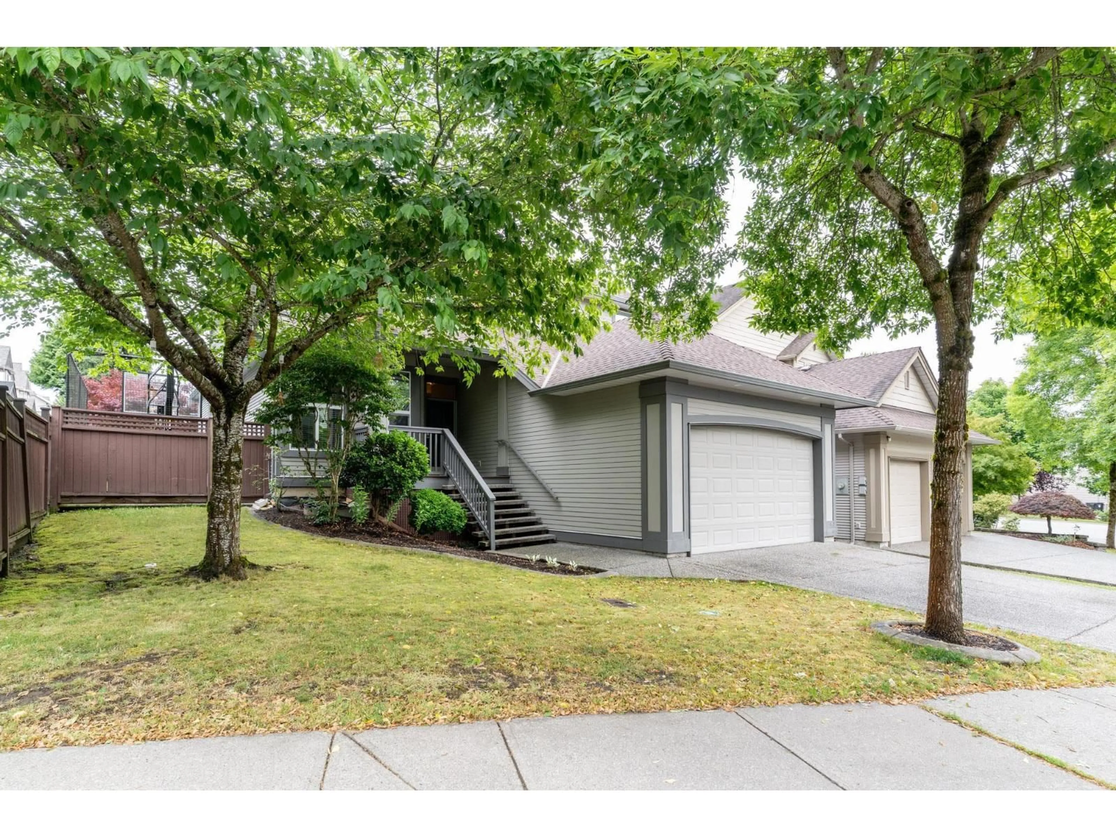 Home with vinyl exterior material, street for 19657 69A AVENUE, Langley British Columbia V2Y3A6