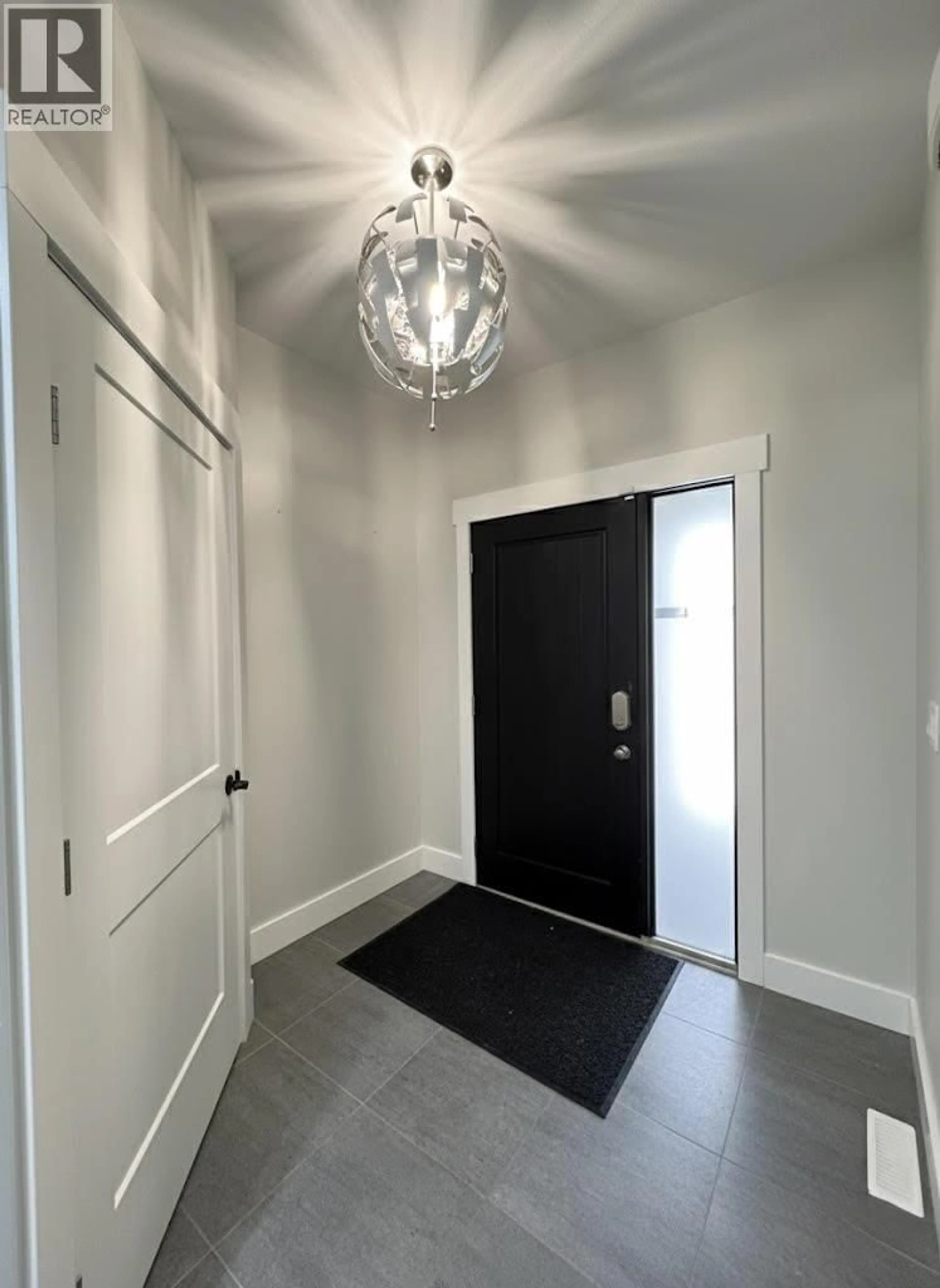 Indoor entryway for 8207 81A STREET, Fort St. John British Columbia V1J0P6