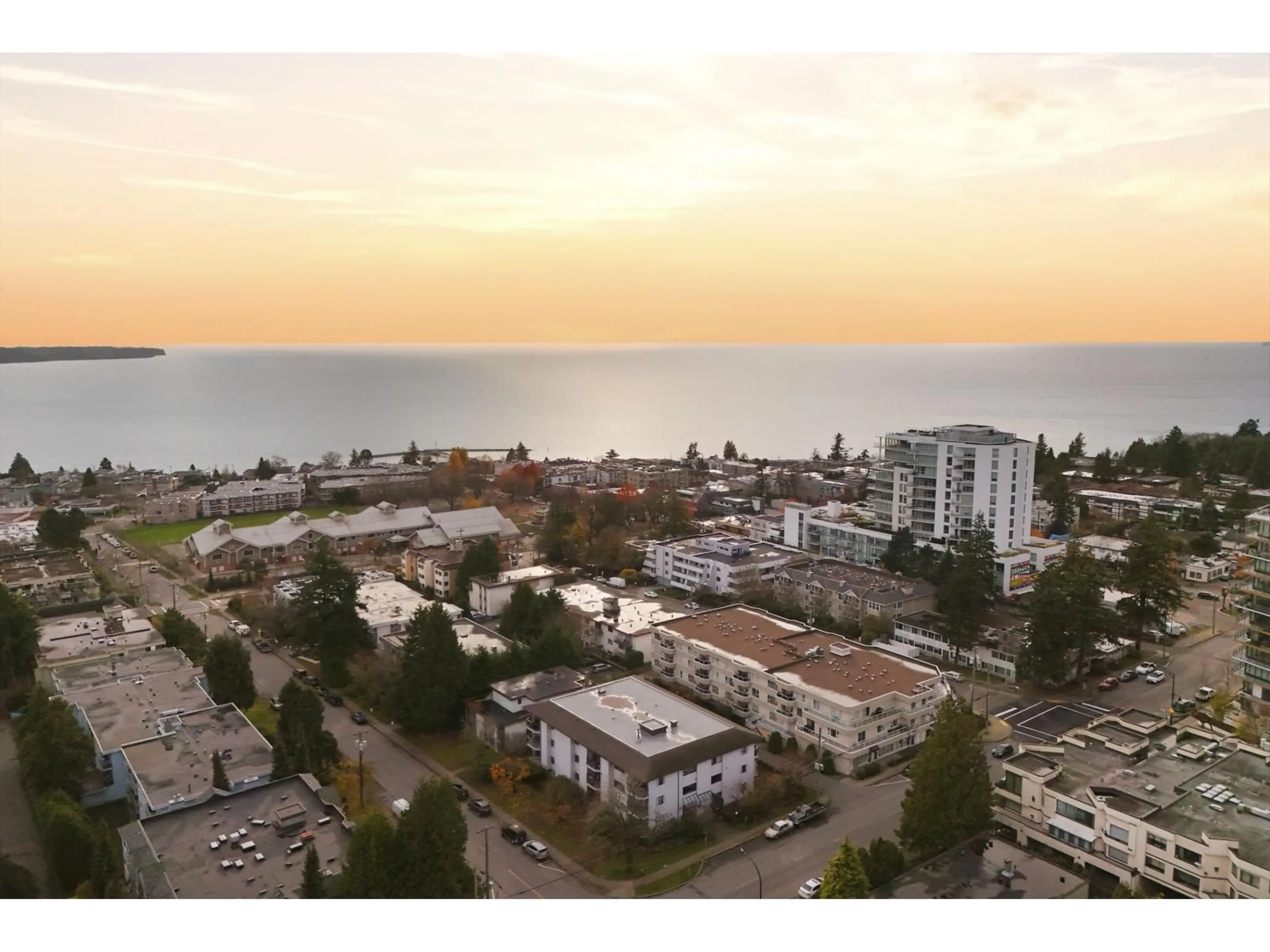 A pic from outside/outdoor area/front of a property/back of a property/a pic from drone, water/lake/river/ocean view for 104 - 15290 THRIFT AVENUE, White Rock British Columbia V4B2L8