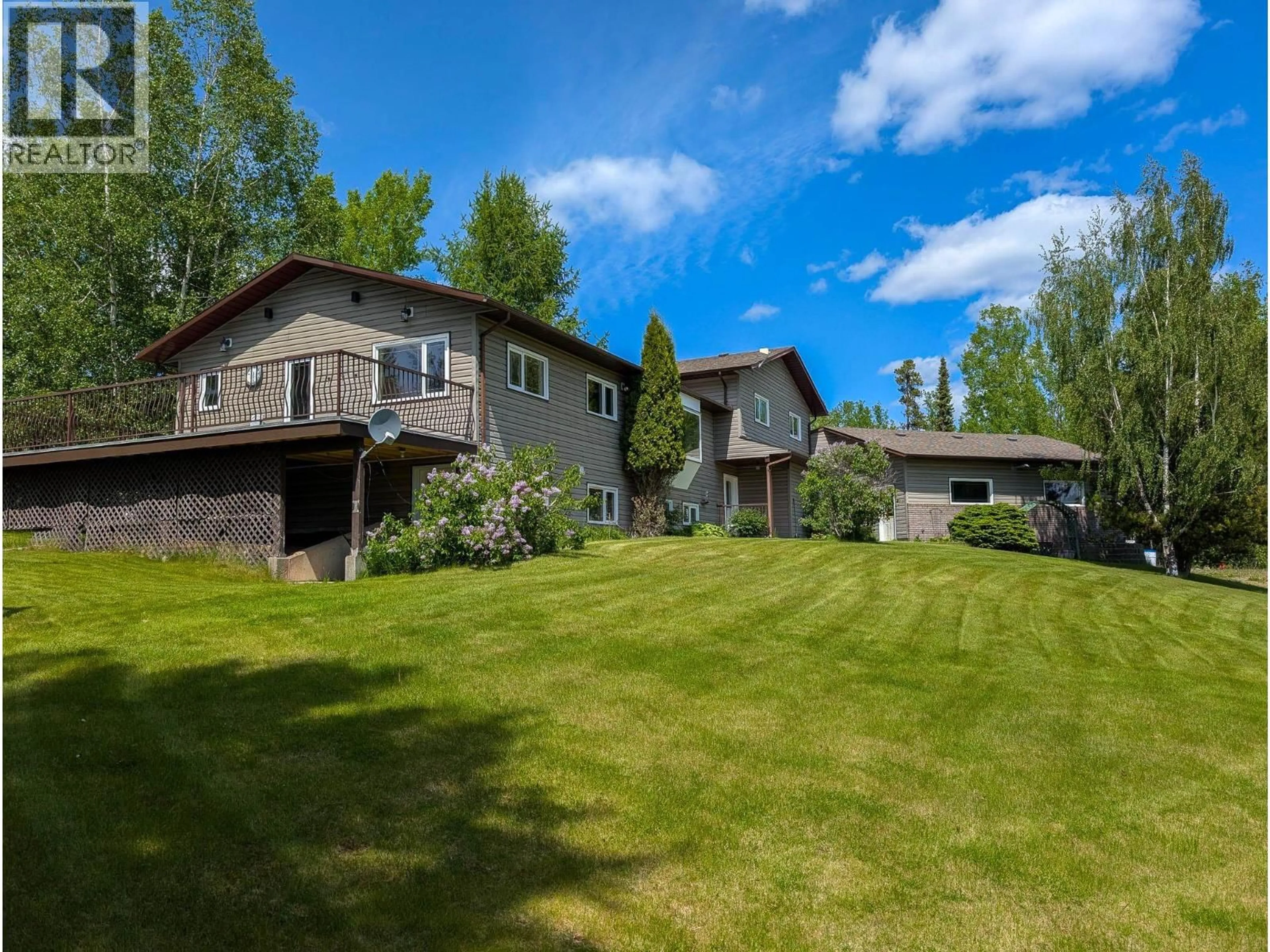 A pic from outside/outdoor area/front of a property/back of a property/a pic from drone, mountain view for 11400 MAURAEN DRIVE, Prince George British Columbia V2N5B7