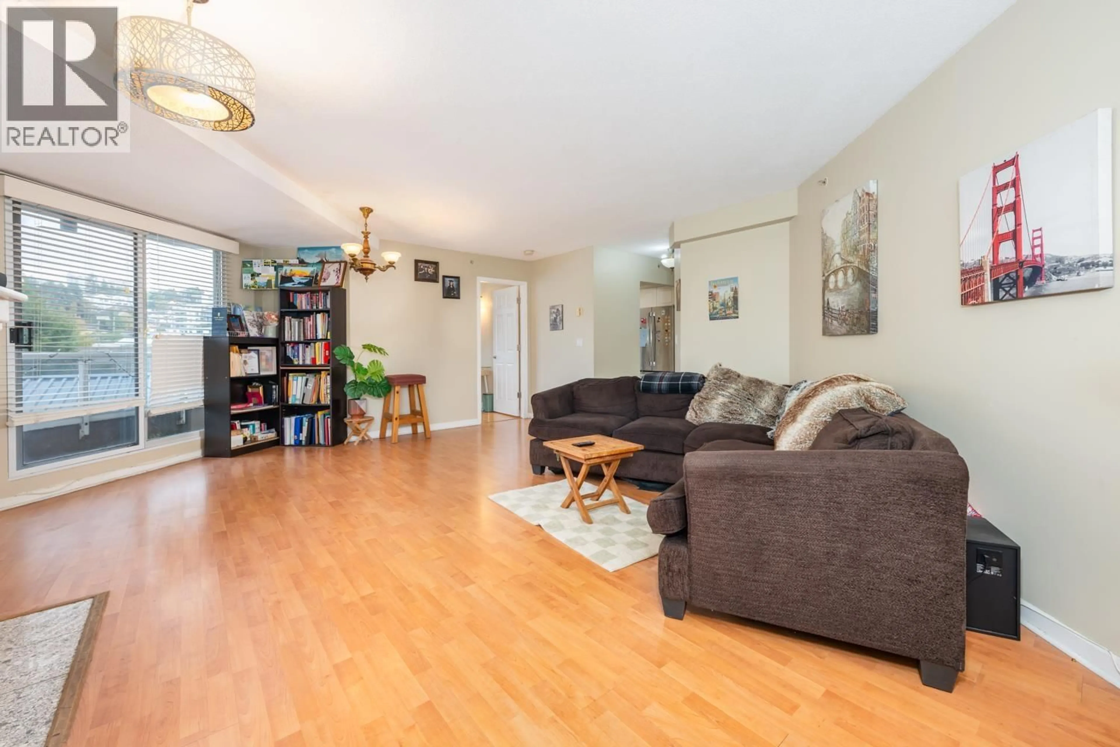 Living room with furniture, wood/laminate floor for 405 - 1185 QUAYSIDE DRIVE, New Westminster British Columbia V3M6T8