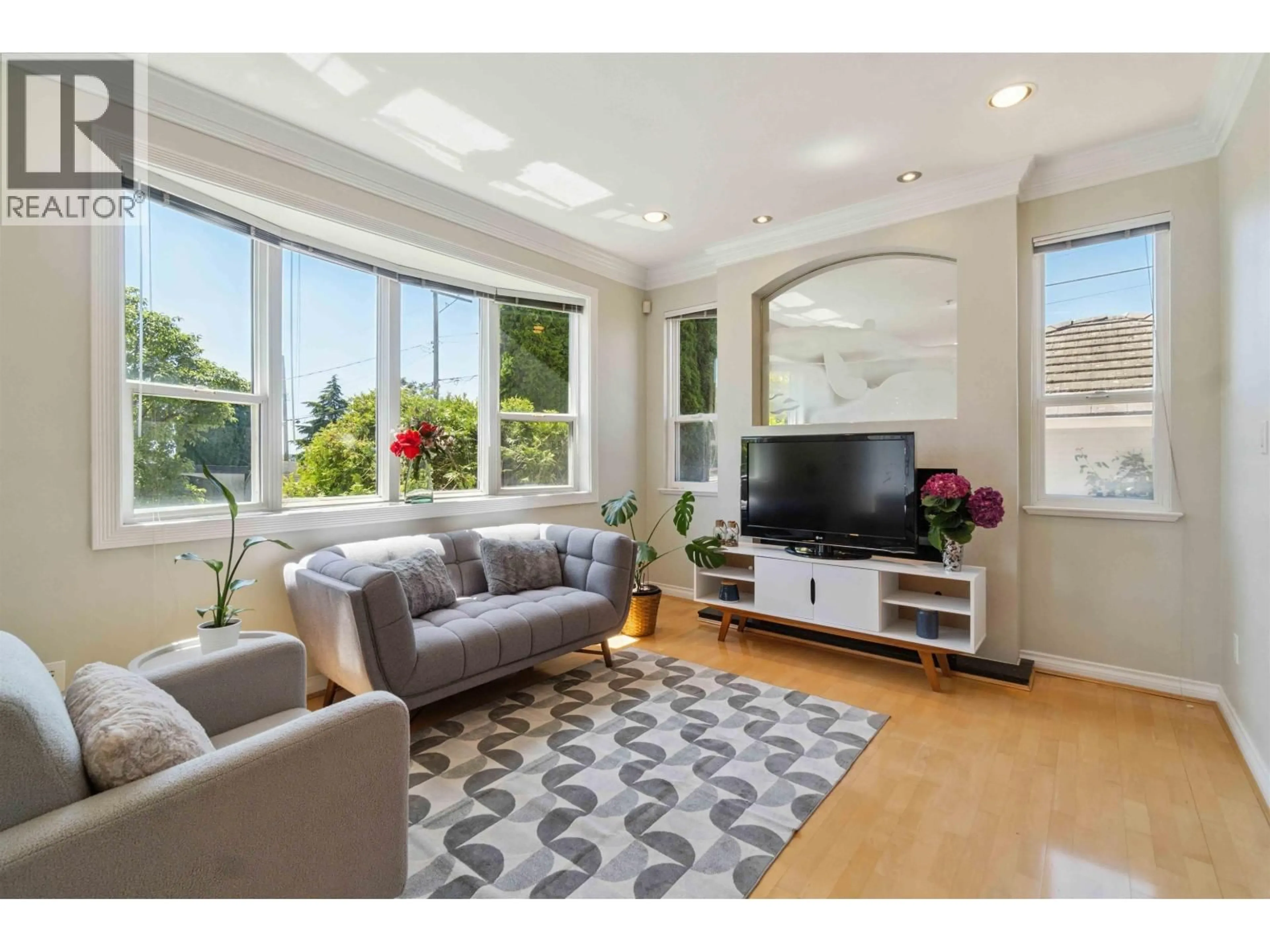 Living room with furniture, wood/laminate floor for 1303 67TH AVENUE, Vancouver British Columbia V6P2T3