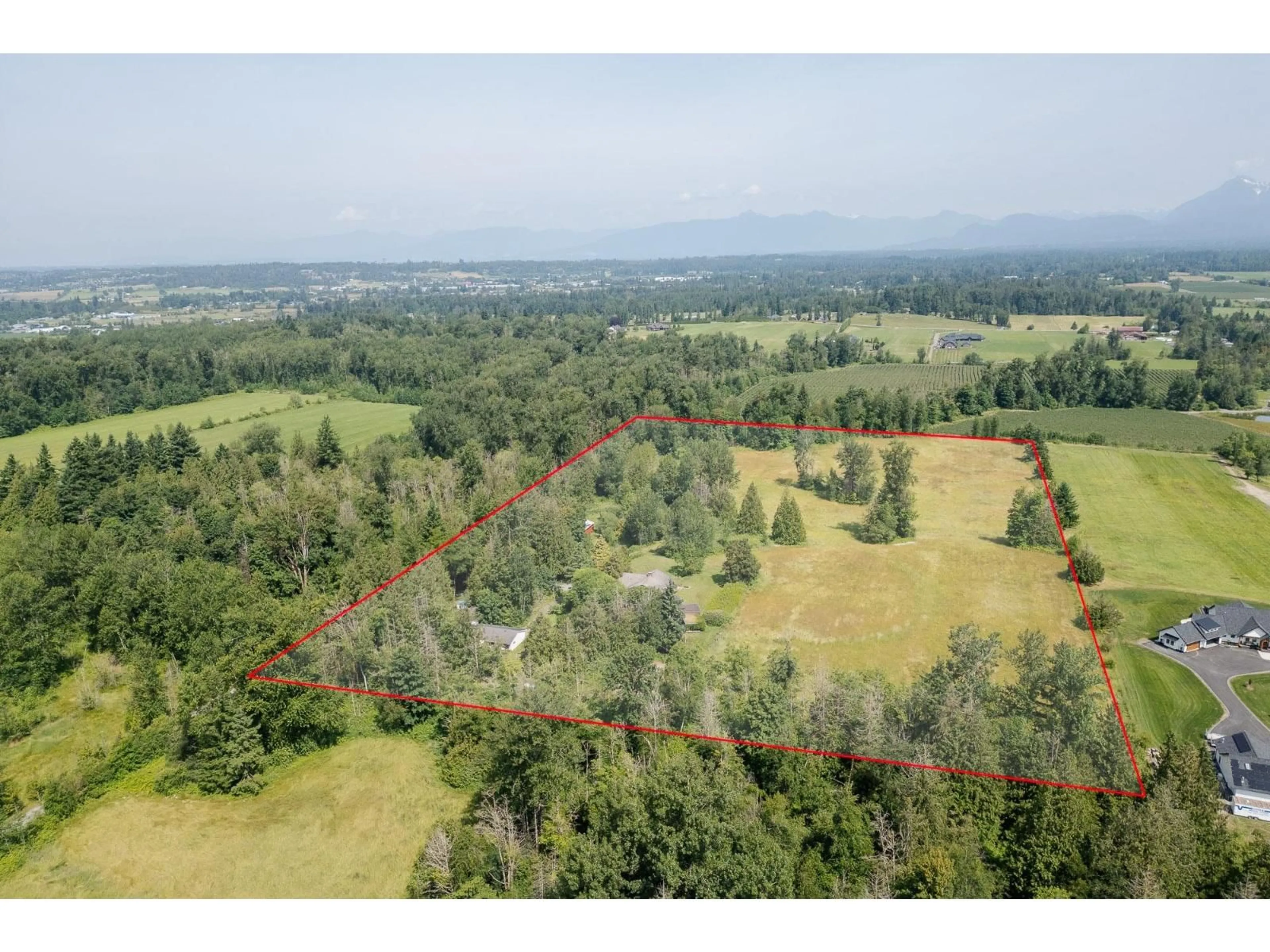 A pic from outside/outdoor area/front of a property/back of a property/a pic from drone, forest/trees view for 22801 48 AVENUE, Langley British Columbia V2Z2T7