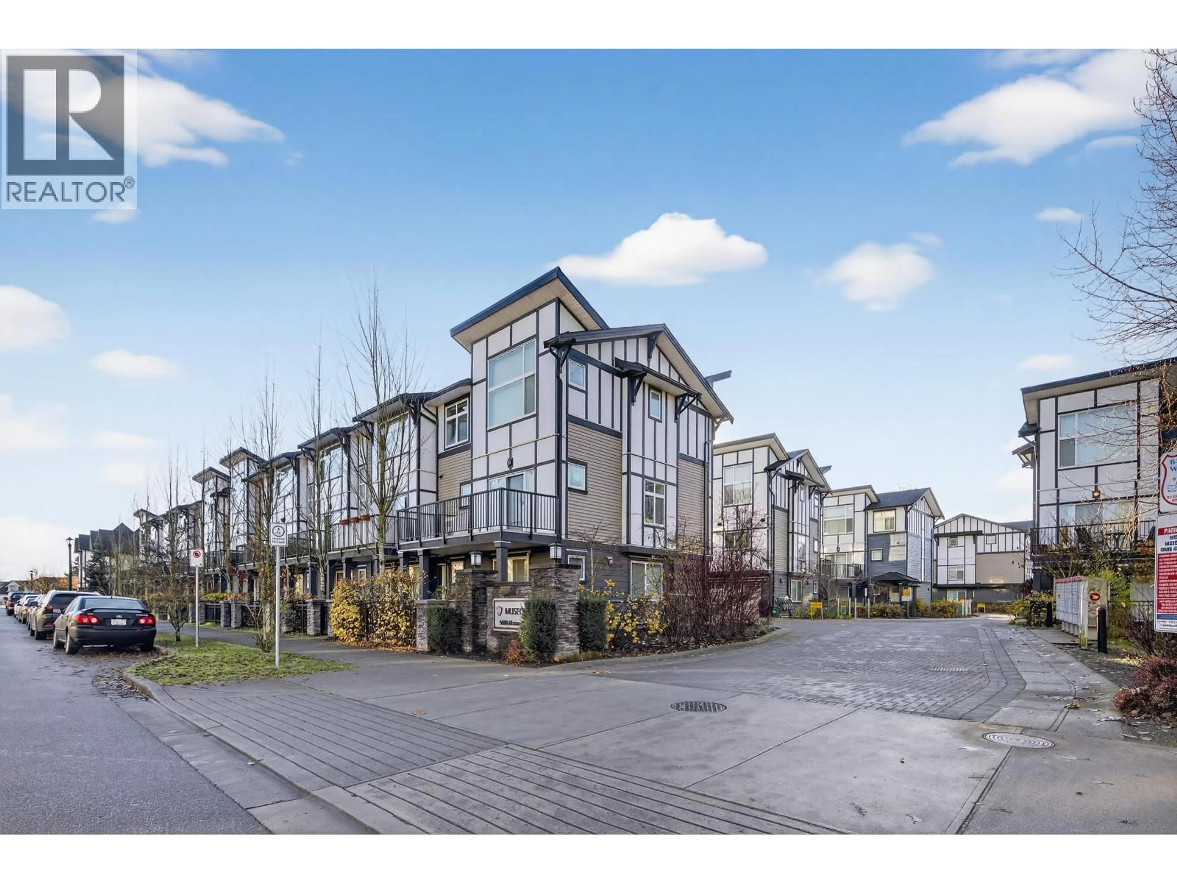 A pic from outside/outdoor area/front of a property/back of a property/a pic from drone, street for 4 - 9680 ALEXANDRA ROAD, Richmond British Columbia V6X0P2