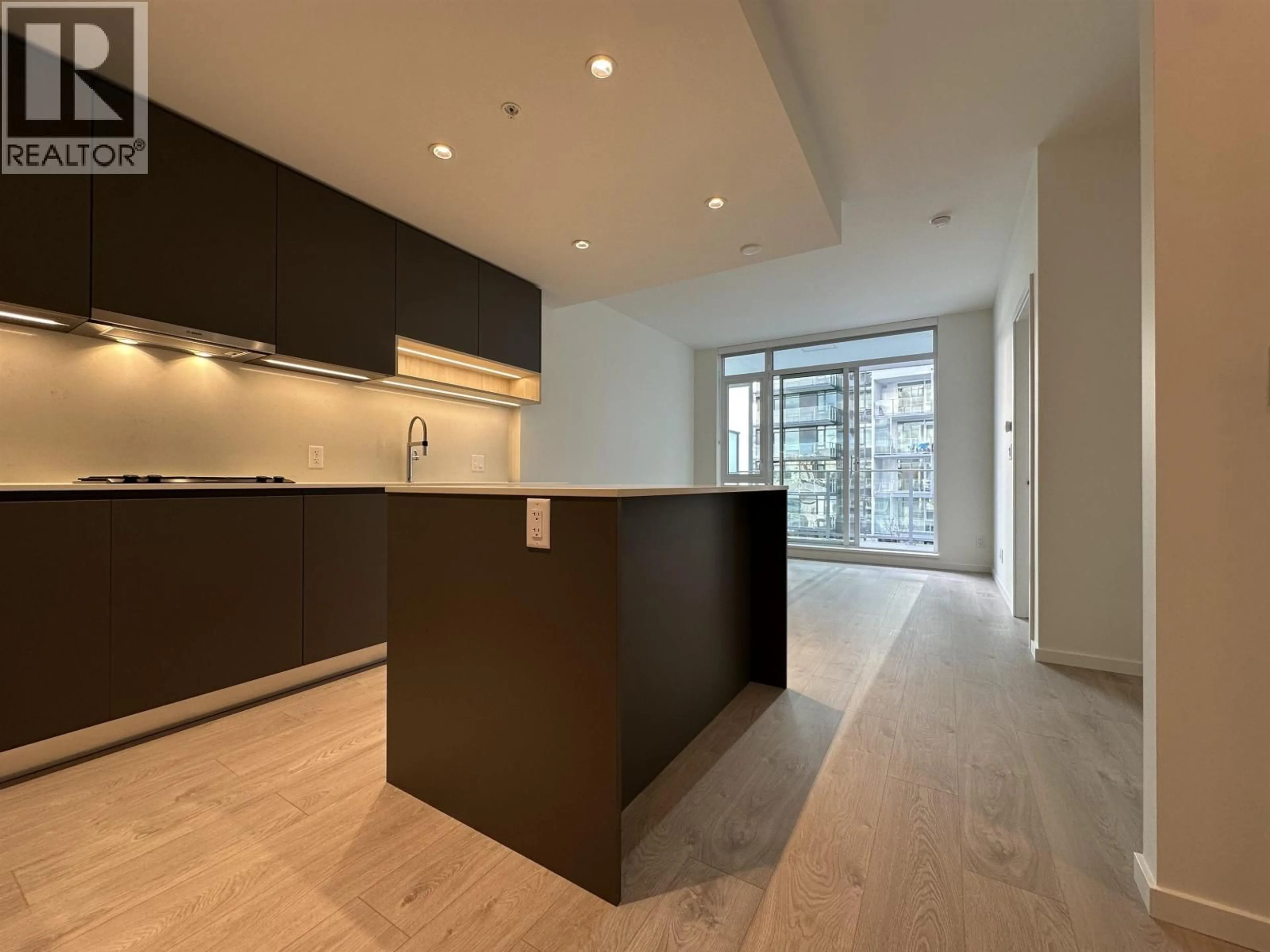 Open concept kitchen, wood/laminate floor for 623 - 6300 MINORU BOULEVARD, Richmond British Columbia V6Y0N1