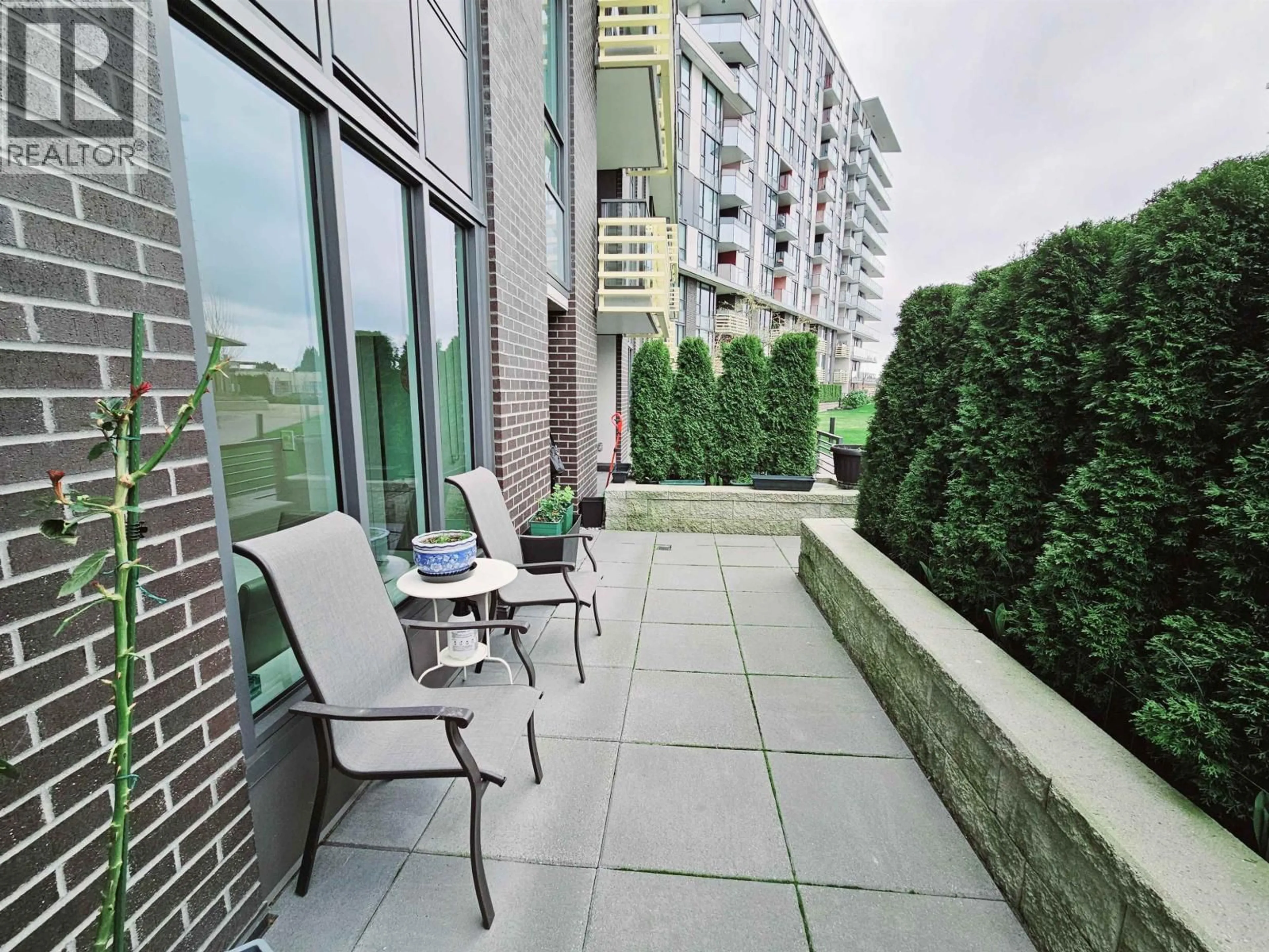 Patio, city buildings view from balcony for 307 - 3699 SEXSMITH ROAD, Richmond British Columbia V6X0W4