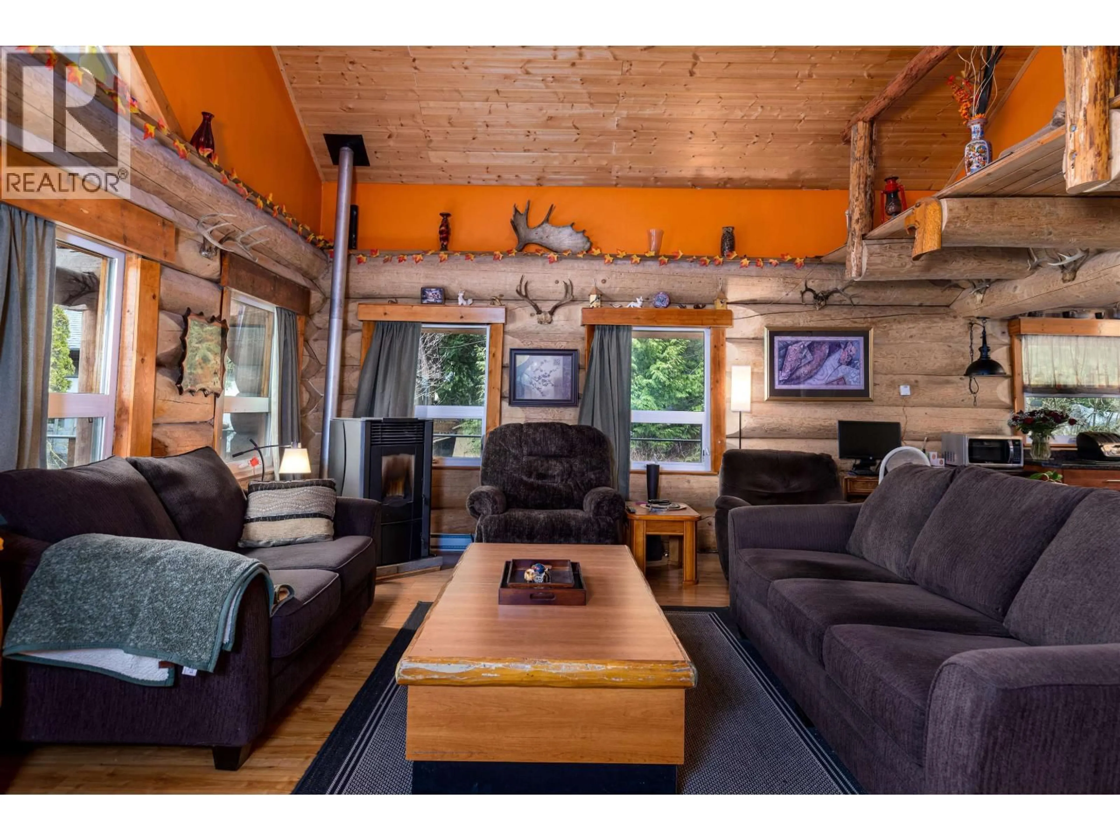 Living room with furniture, wood/laminate floor for 3981 DOBBIE STREET, Terrace British Columbia V8G3M6