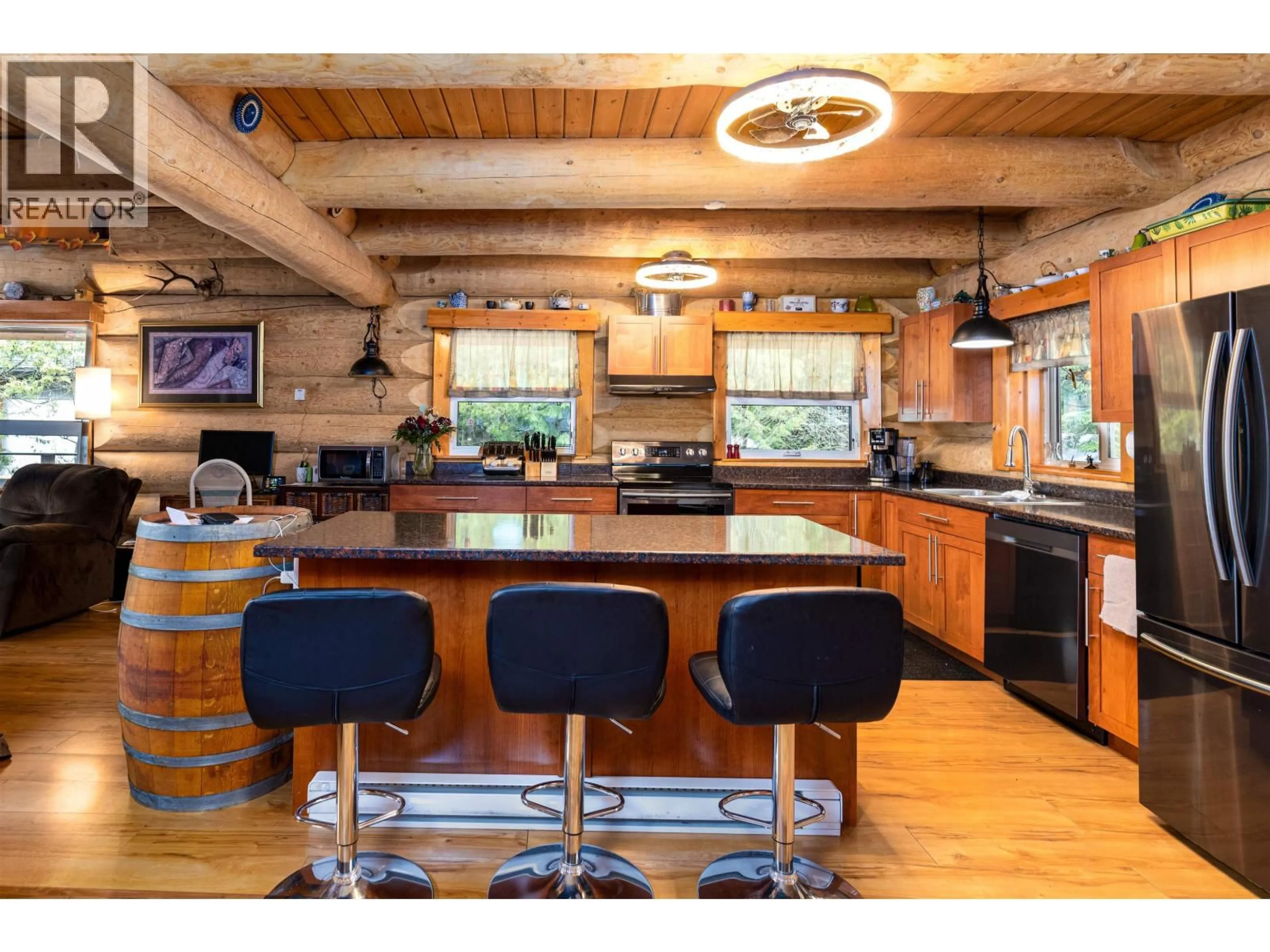 Open concept kitchen, wood/laminate floor for 3981 DOBBIE STREET, Terrace British Columbia V8G3M6