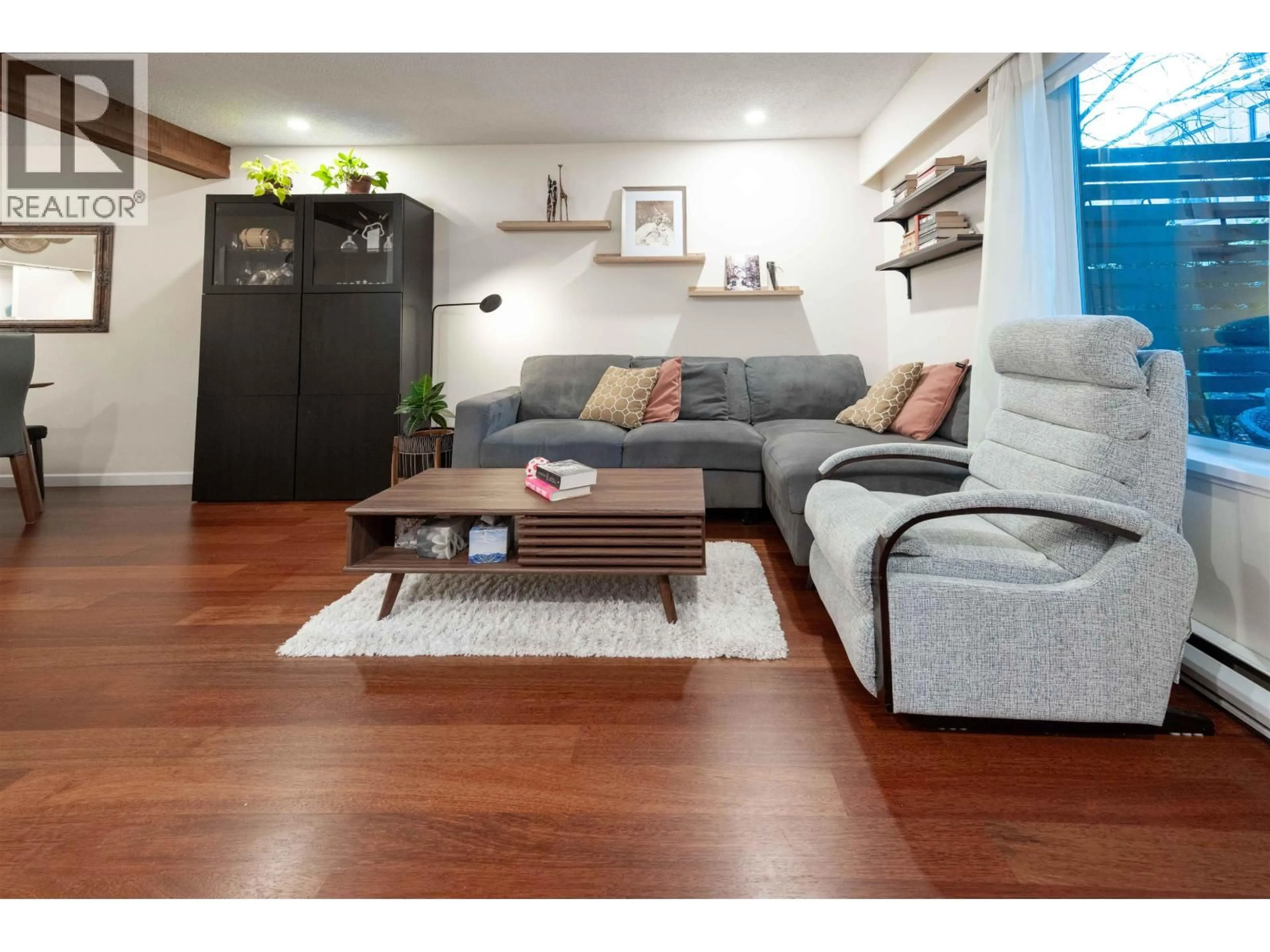 Living room with furniture, wood/laminate floor for 112 - 1274 BARCLAY STREET, Vancouver British Columbia V6E1H3