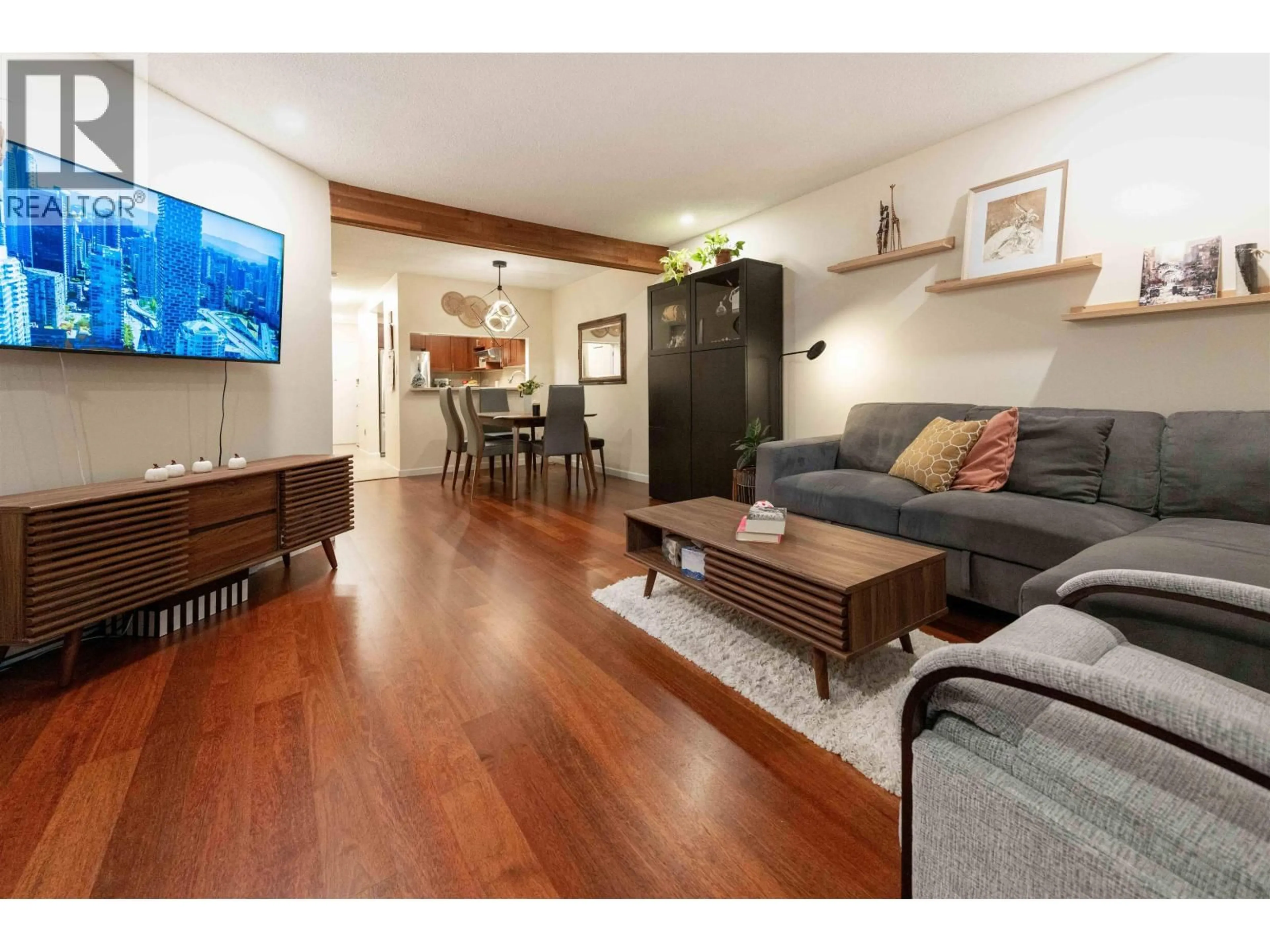 Living room with furniture, wood/laminate floor for 112 - 1274 BARCLAY STREET, Vancouver British Columbia V6E1H3