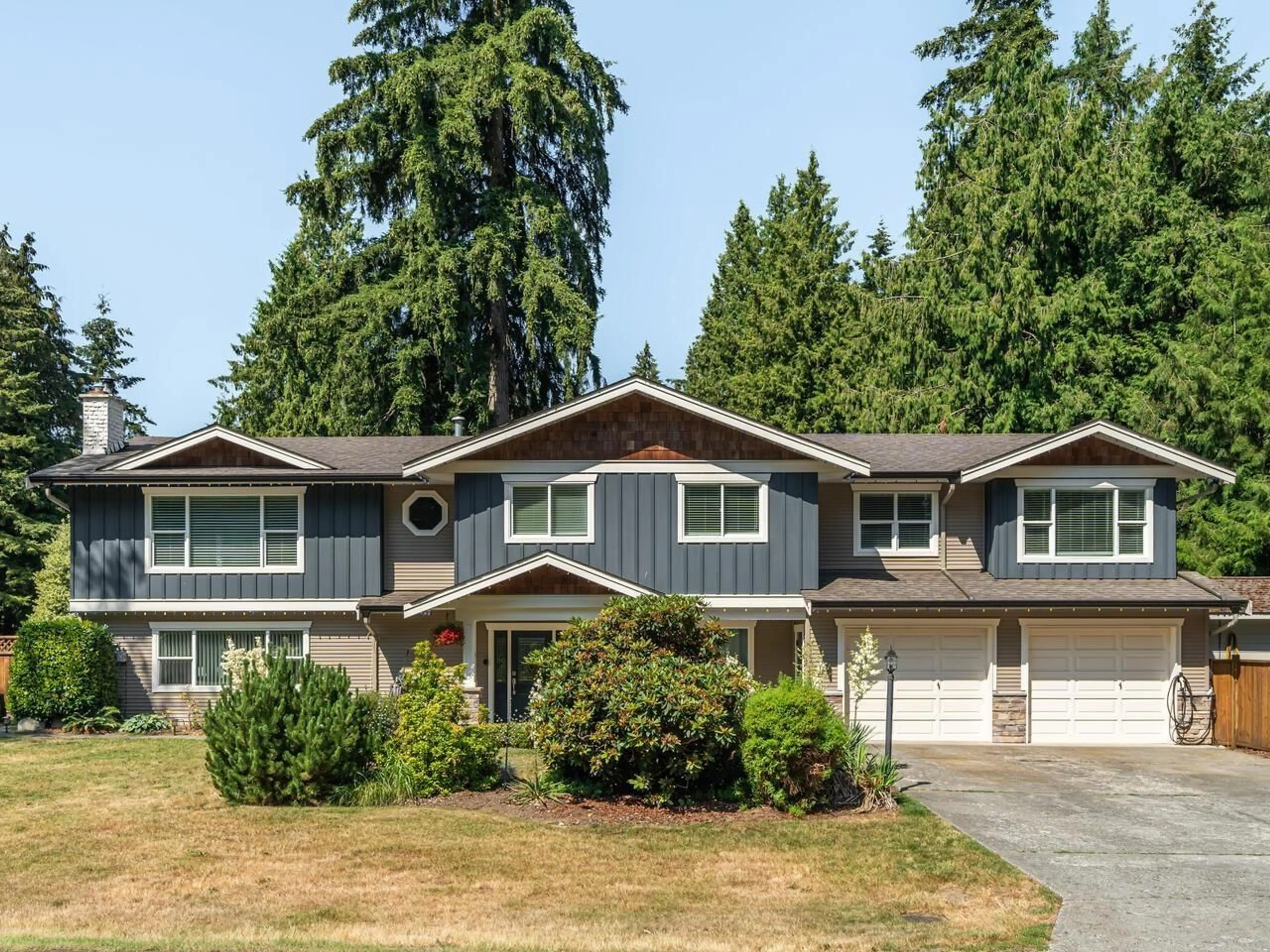 Home with vinyl exterior material, street for 4551 209 STREET, Langley British Columbia V3A2K7