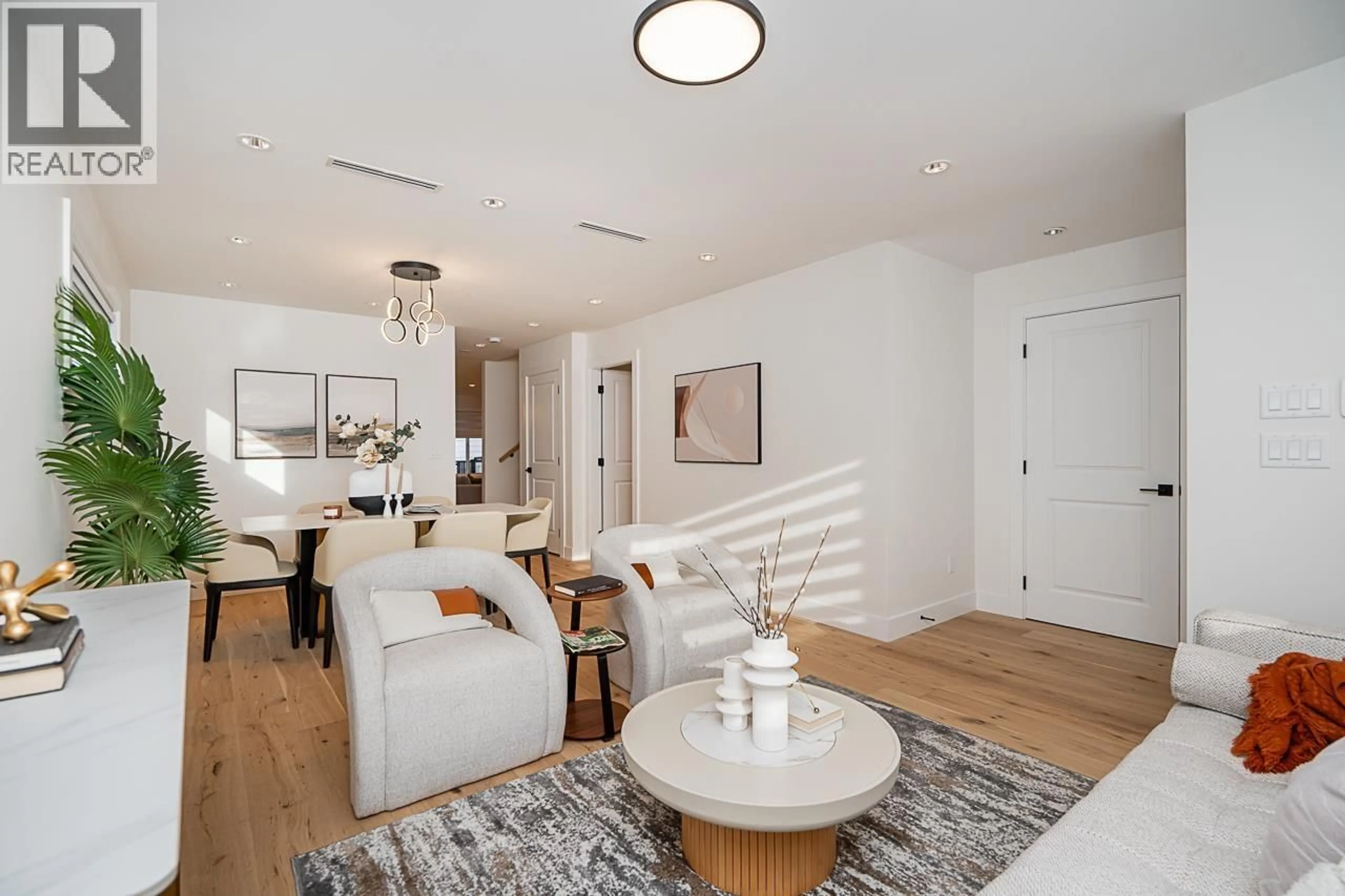 Living room with furniture, unknown for 4917 VENABLES STREET, Burnaby British Columbia V5B1X8