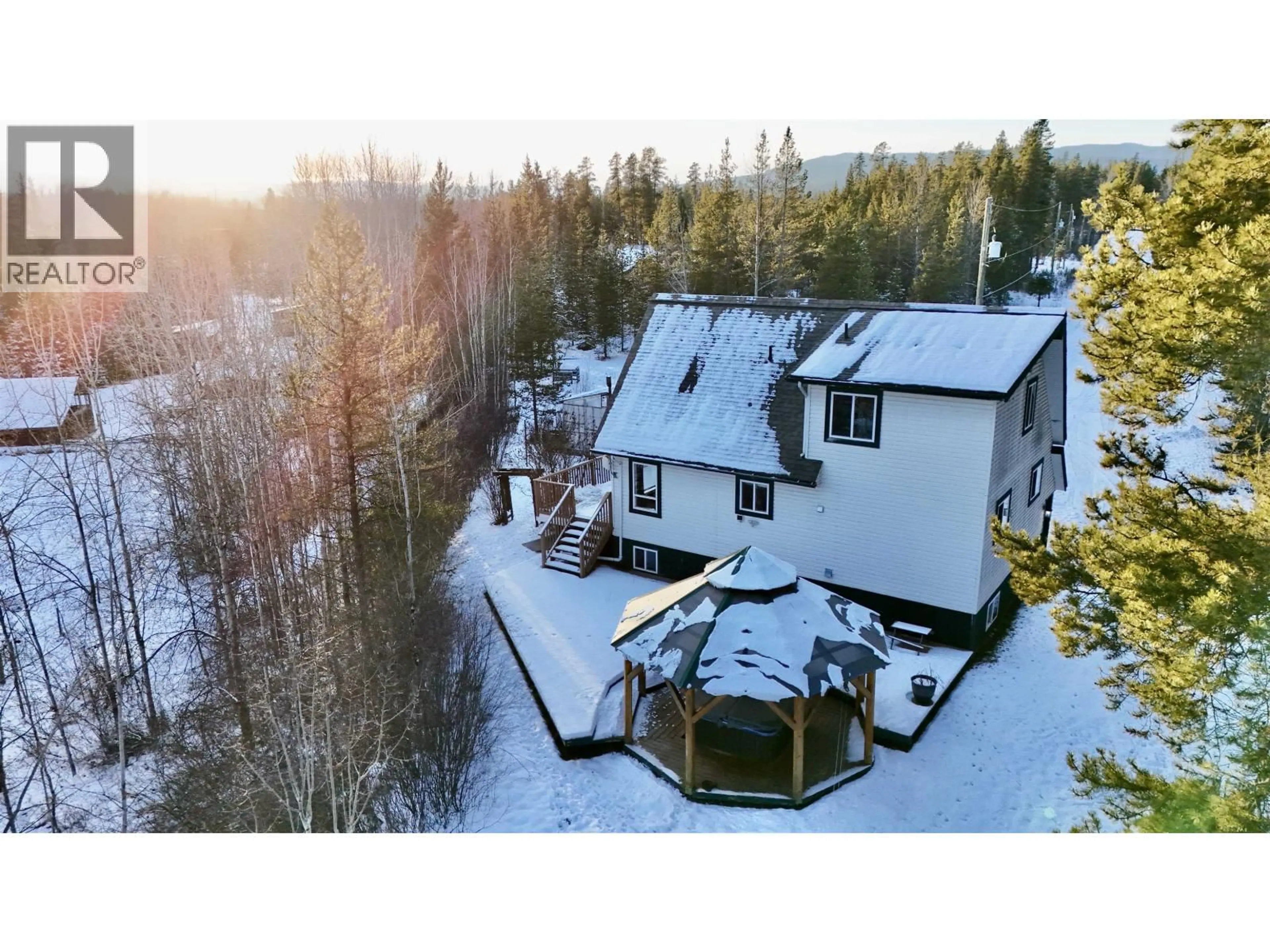 A pic from outside/outdoor area/front of a property/back of a property/a pic from drone, mountain view for 4787 RODNEY ROAD, Smithers British Columbia V0J2N5