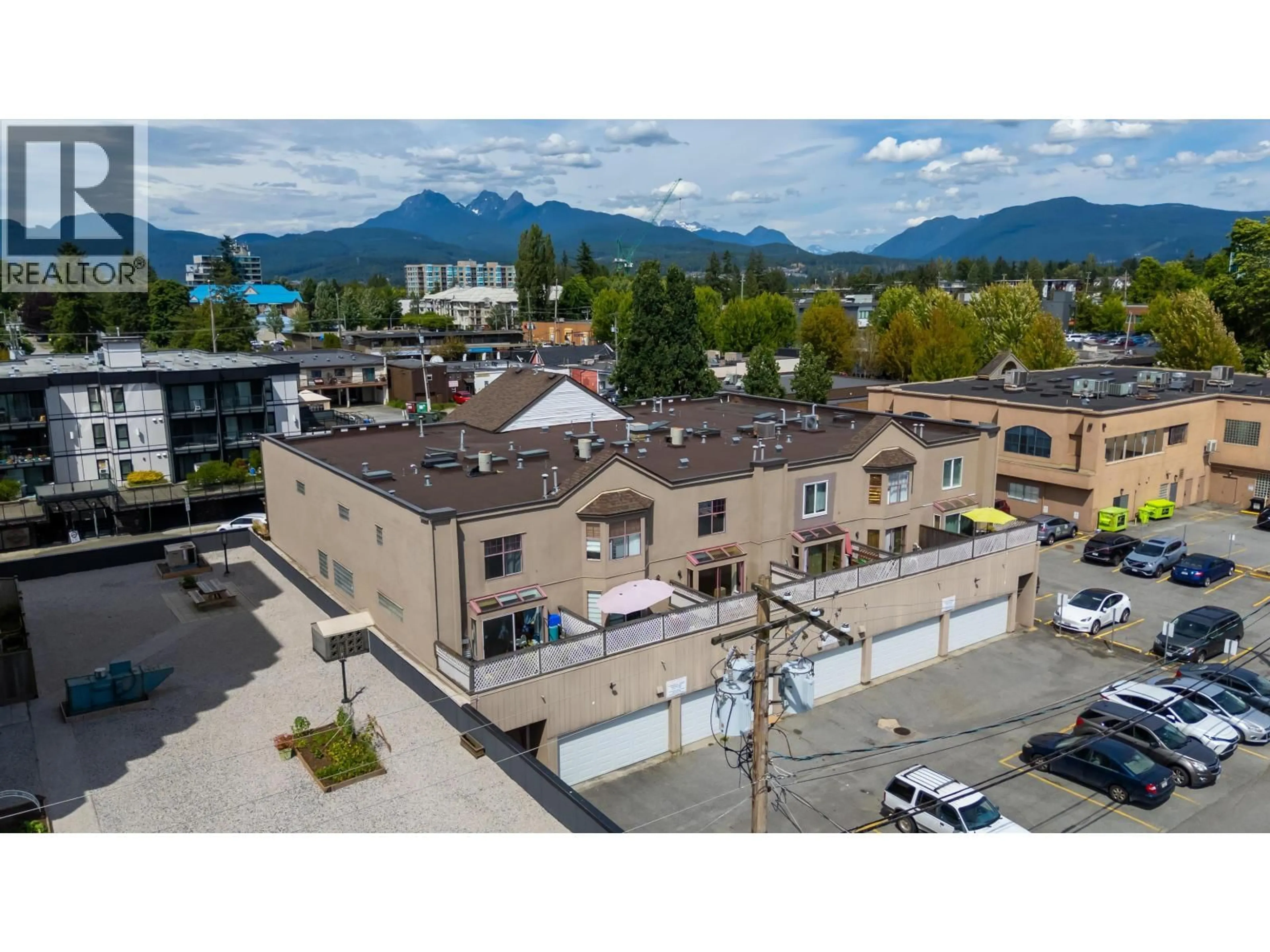 A pic from outside/outdoor area/front of a property/back of a property/a pic from drone, mountain view for 209 - 22356 MCINTOSH AVENUE, Maple Ridge British Columbia V2X3C1