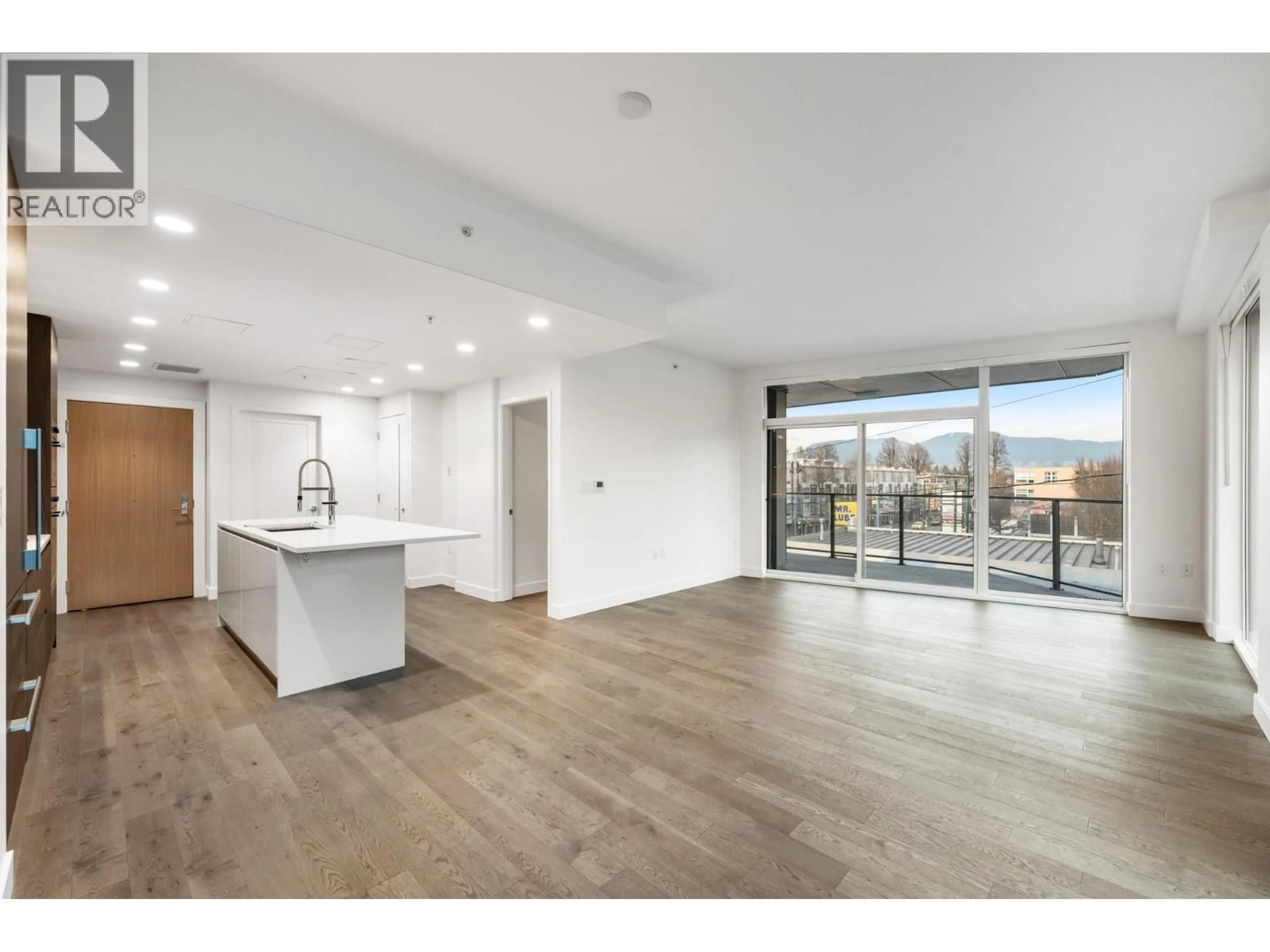 Open concept kitchen, wood/laminate floor for 302 - 2888 ARBUTUS STREET, Vancouver British Columbia V6J0J1