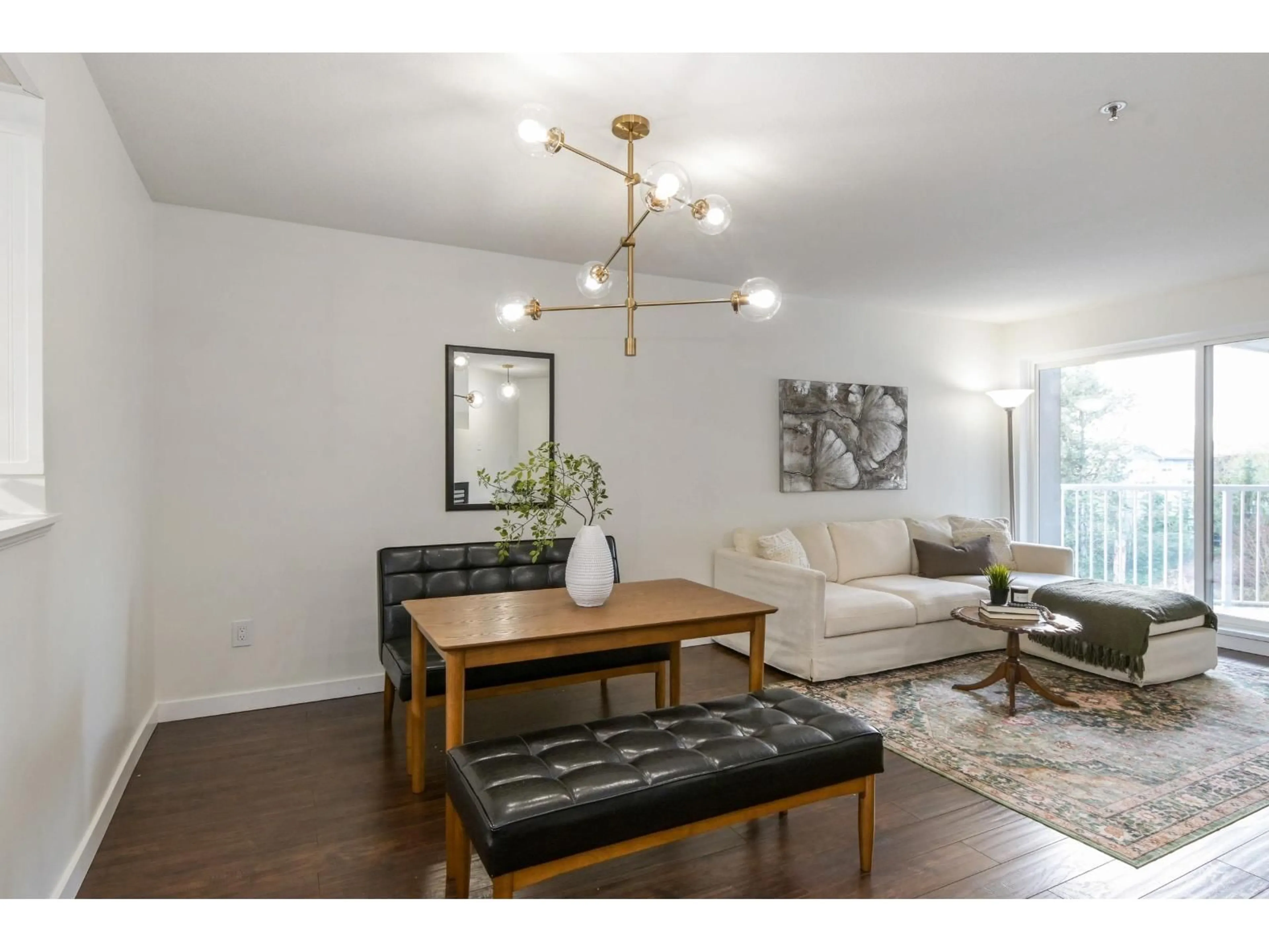 Living room with furniture, wood/laminate floor for 401 - 5465 201 STREET, Langley British Columbia V3A1P8