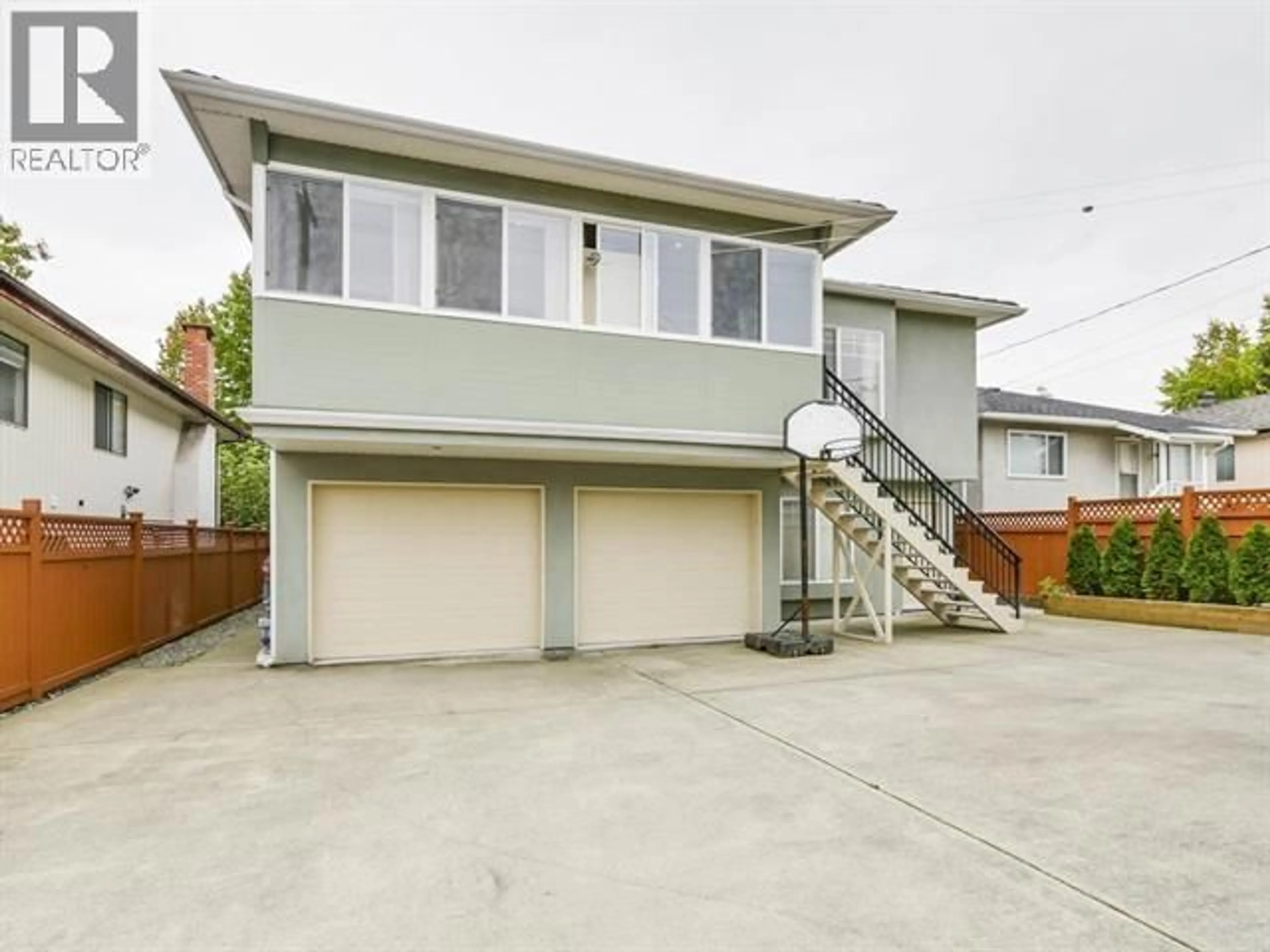 Home with vinyl exterior material, street for 4407 PARKER STREET, Burnaby British Columbia V5C3C7