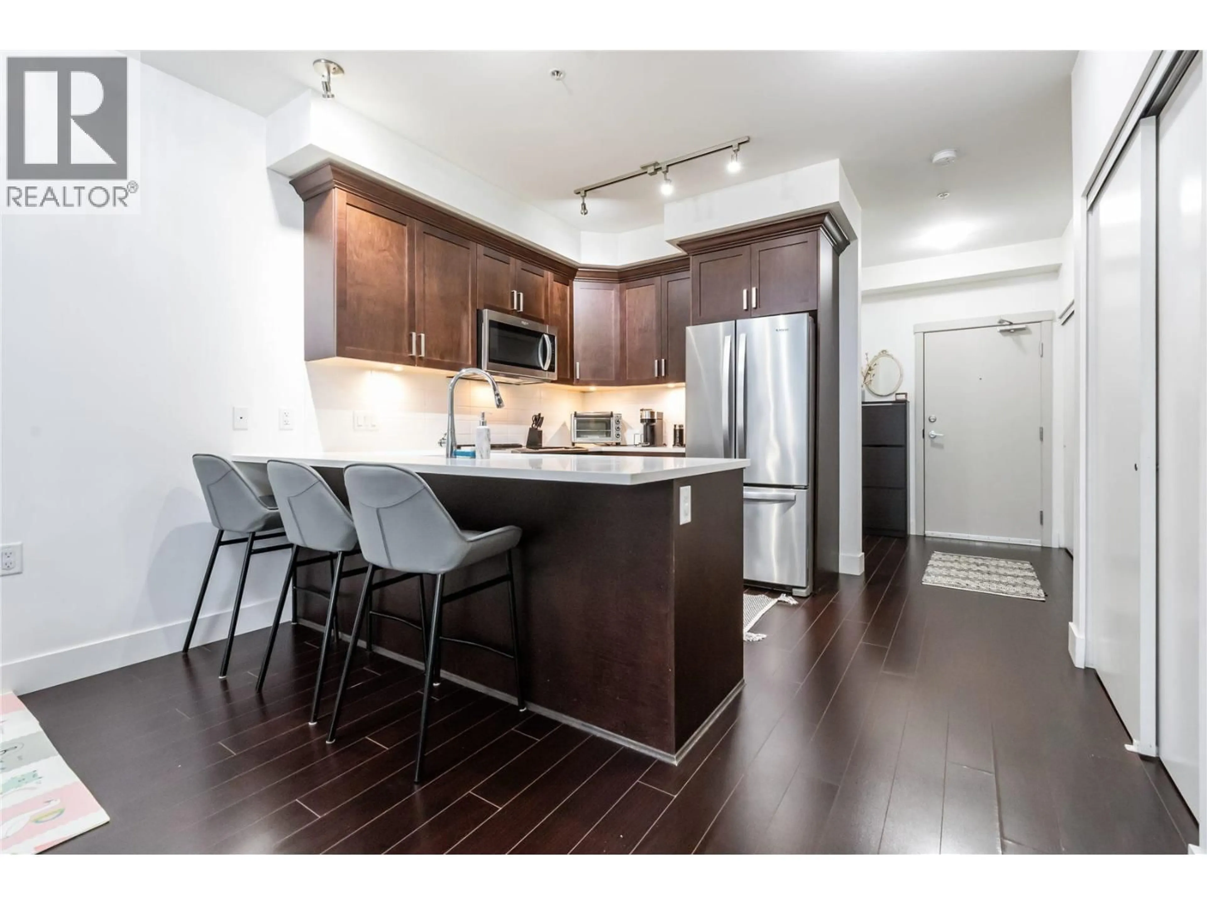 Open concept kitchen, wood/laminate floor for 205 - 2436 KELLY AVENUE, Port Coquitlam British Columbia V3C1Y4