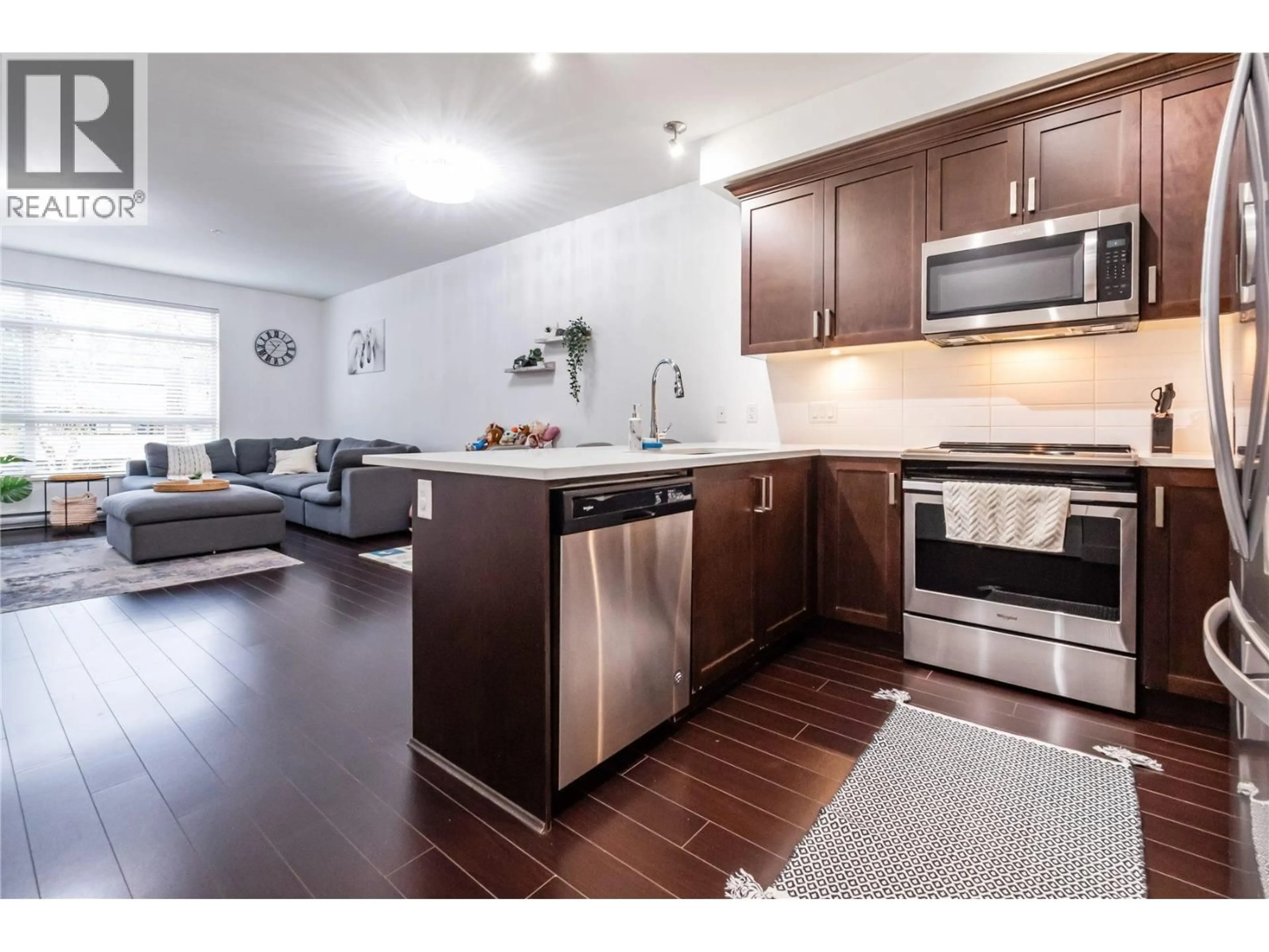 Open concept kitchen, wood/laminate floor for 205 - 2436 KELLY AVENUE, Port Coquitlam British Columbia V3C1Y4