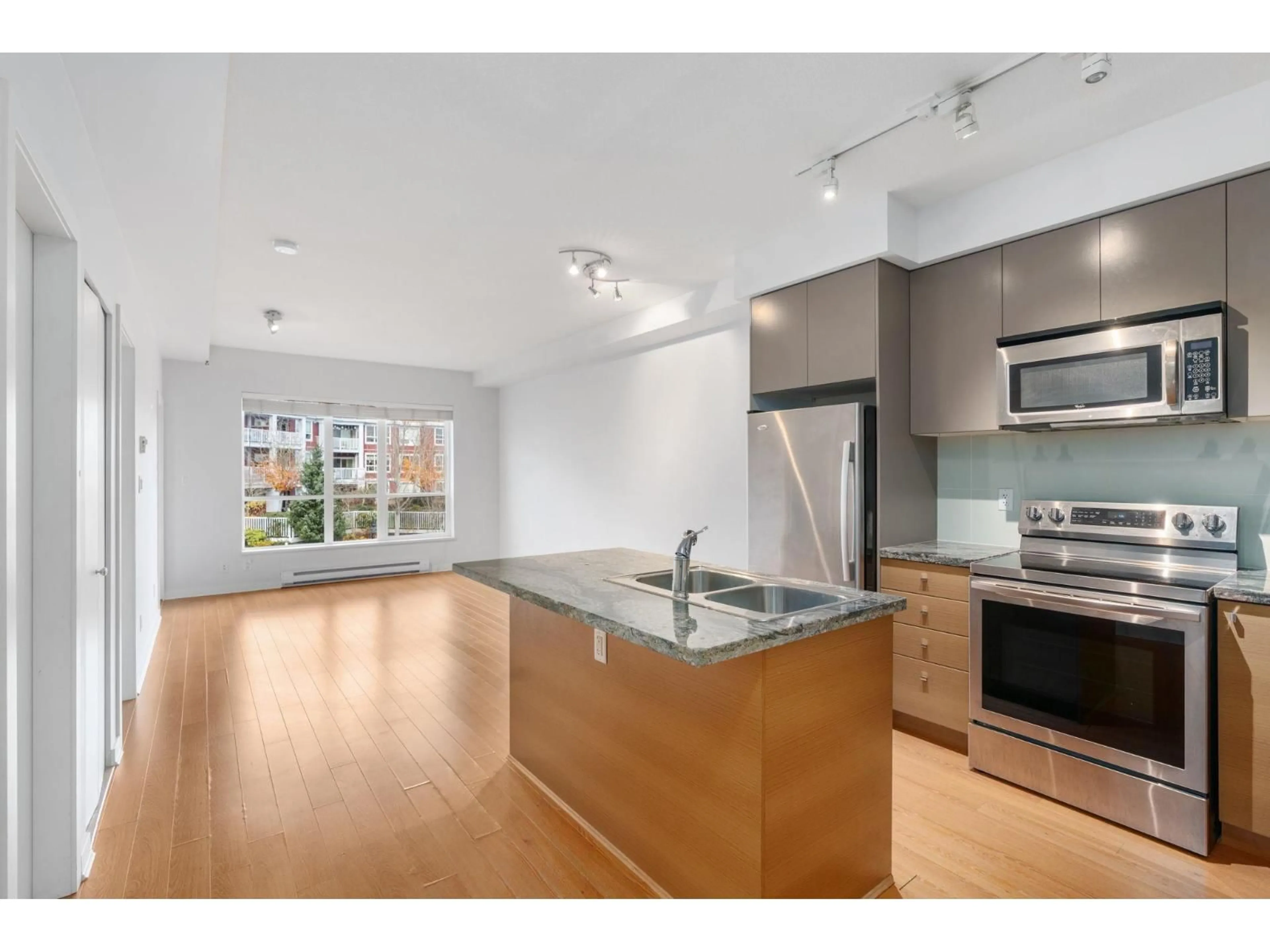 Open concept kitchen, unknown for 413 - 6440 194 STREET, Surrey British Columbia V4N6J7