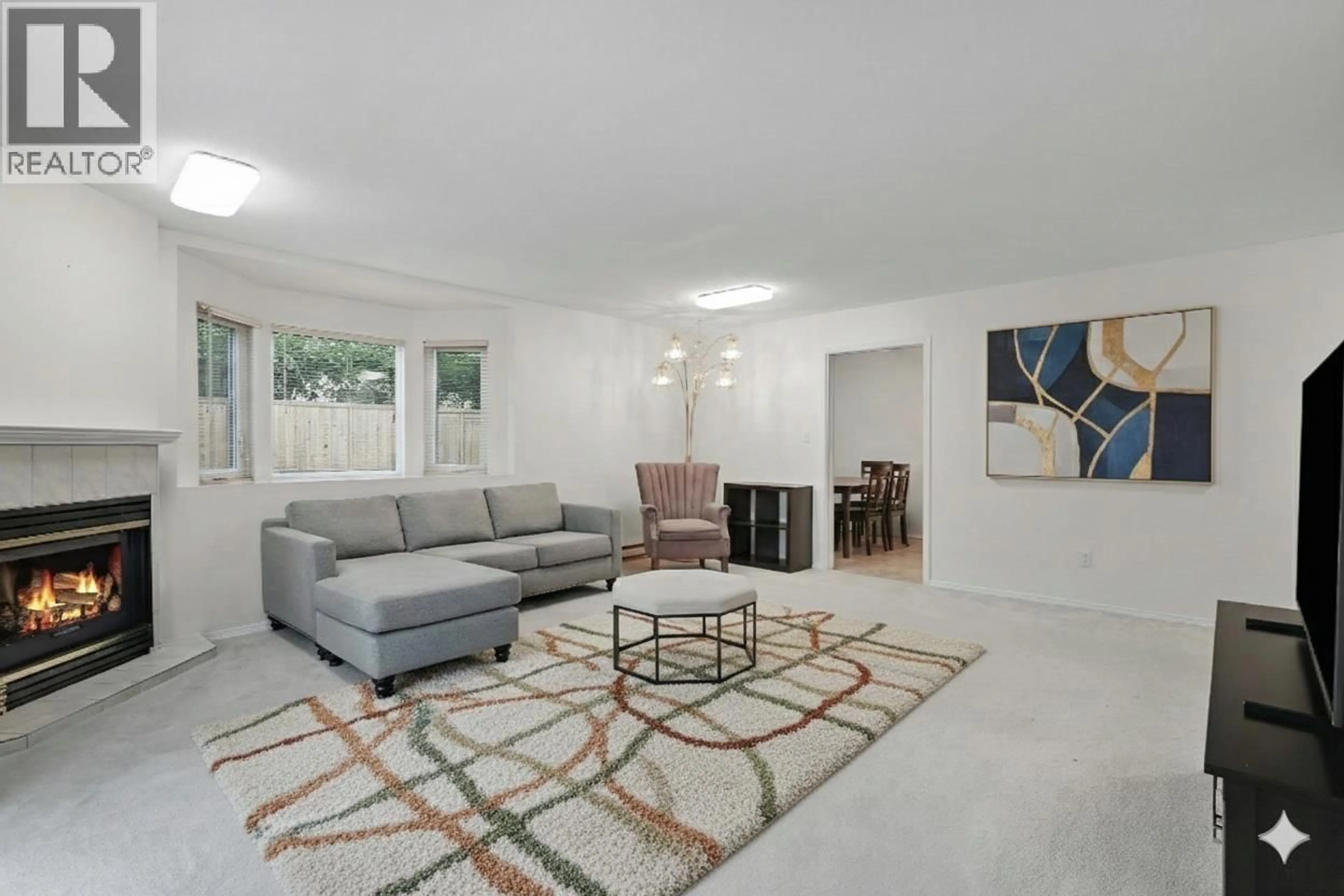 Living room with furniture, unknown for 5 - 7901 13TH AVENUE, Burnaby British Columbia V3N2E8