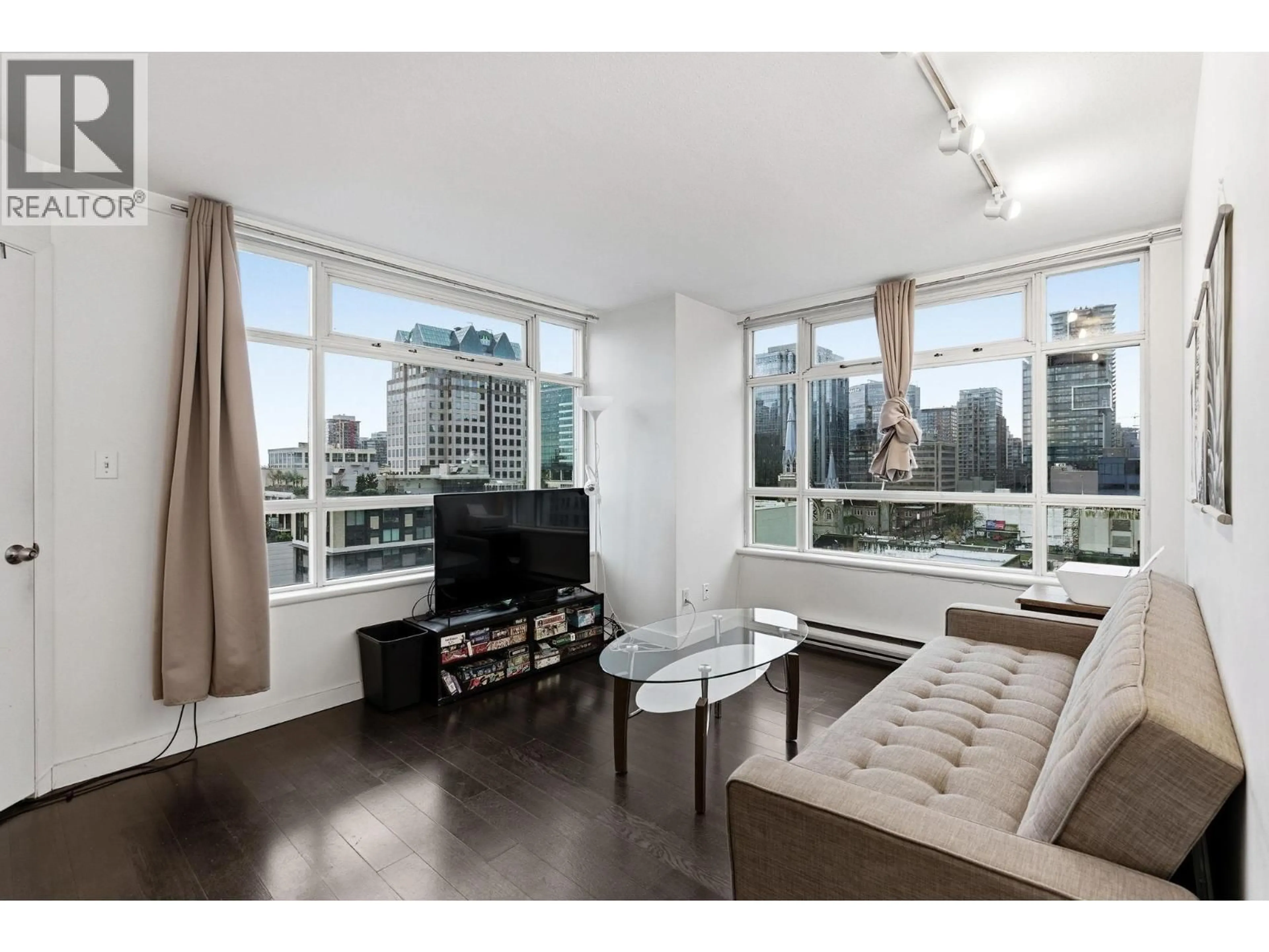 Living room with furniture, wood/laminate floor for 1409 - 438 SEYMOUR STREET, Vancouver British Columbia V6B6H4