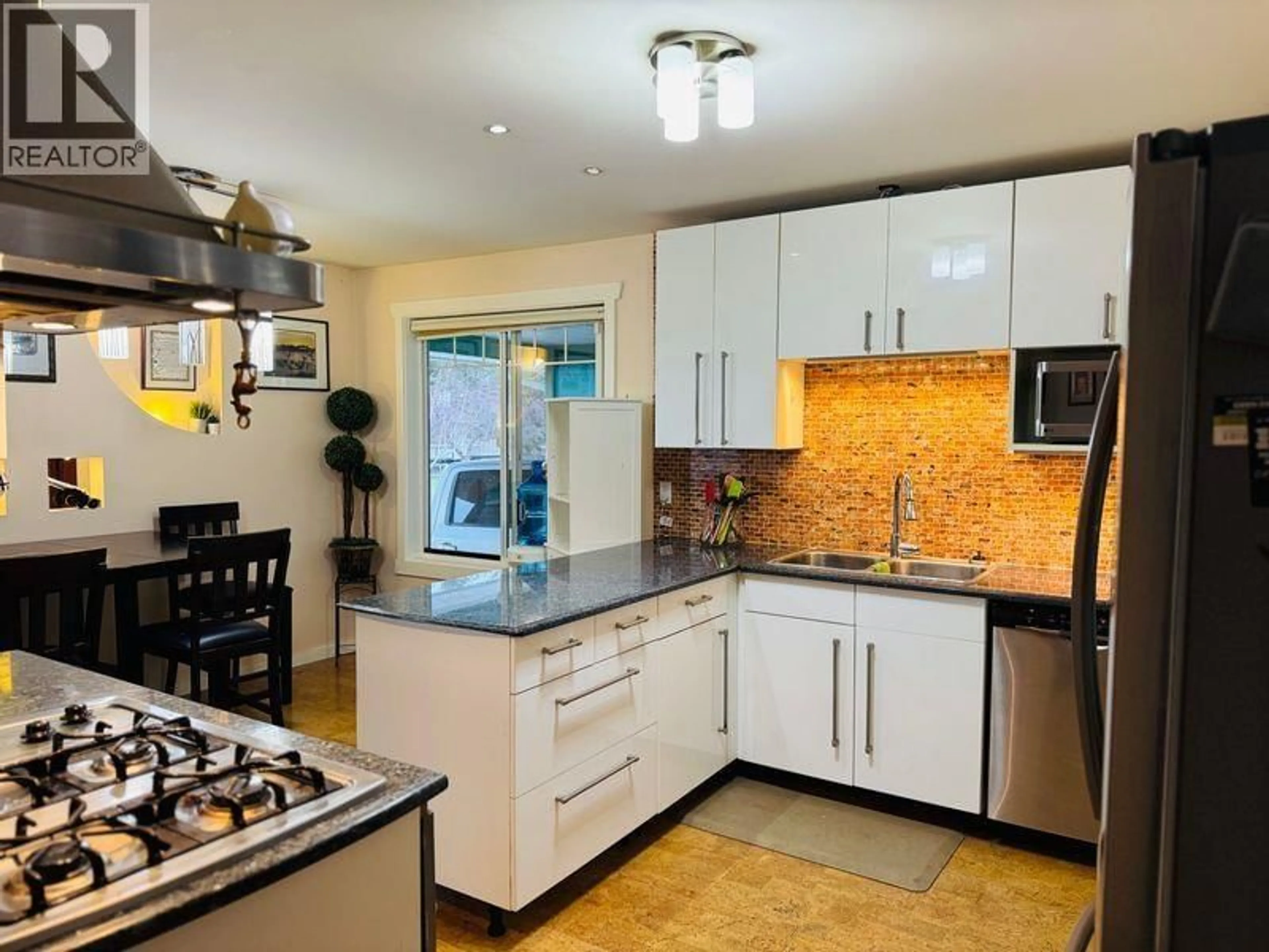 Open concept kitchen, ceramic/tile floor for 1280 ELEVENTH AVENUE, Williams Lake British Columbia V2G2N2