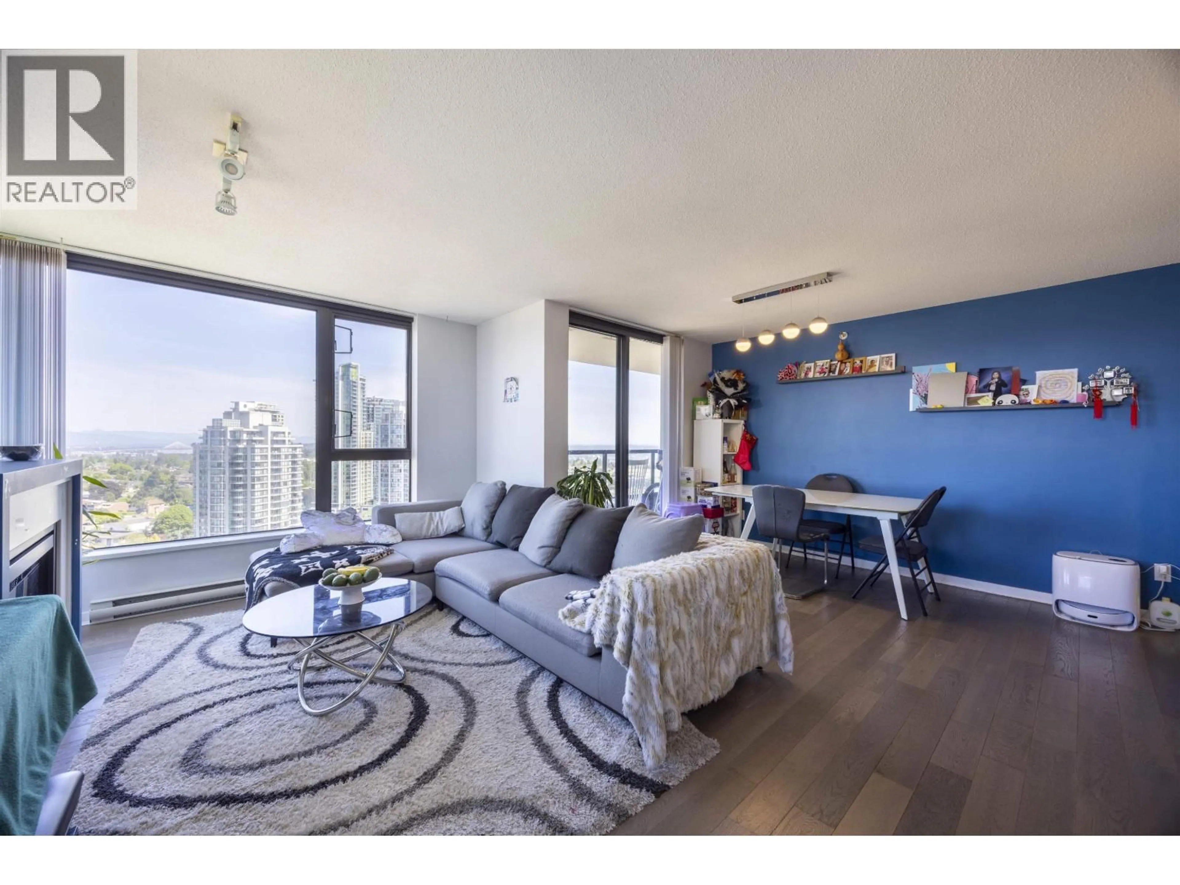 Living room with furniture, wood/laminate floor for 2103 - 7063 HALL AVENUE, Burnaby British Columbia V5E0A5