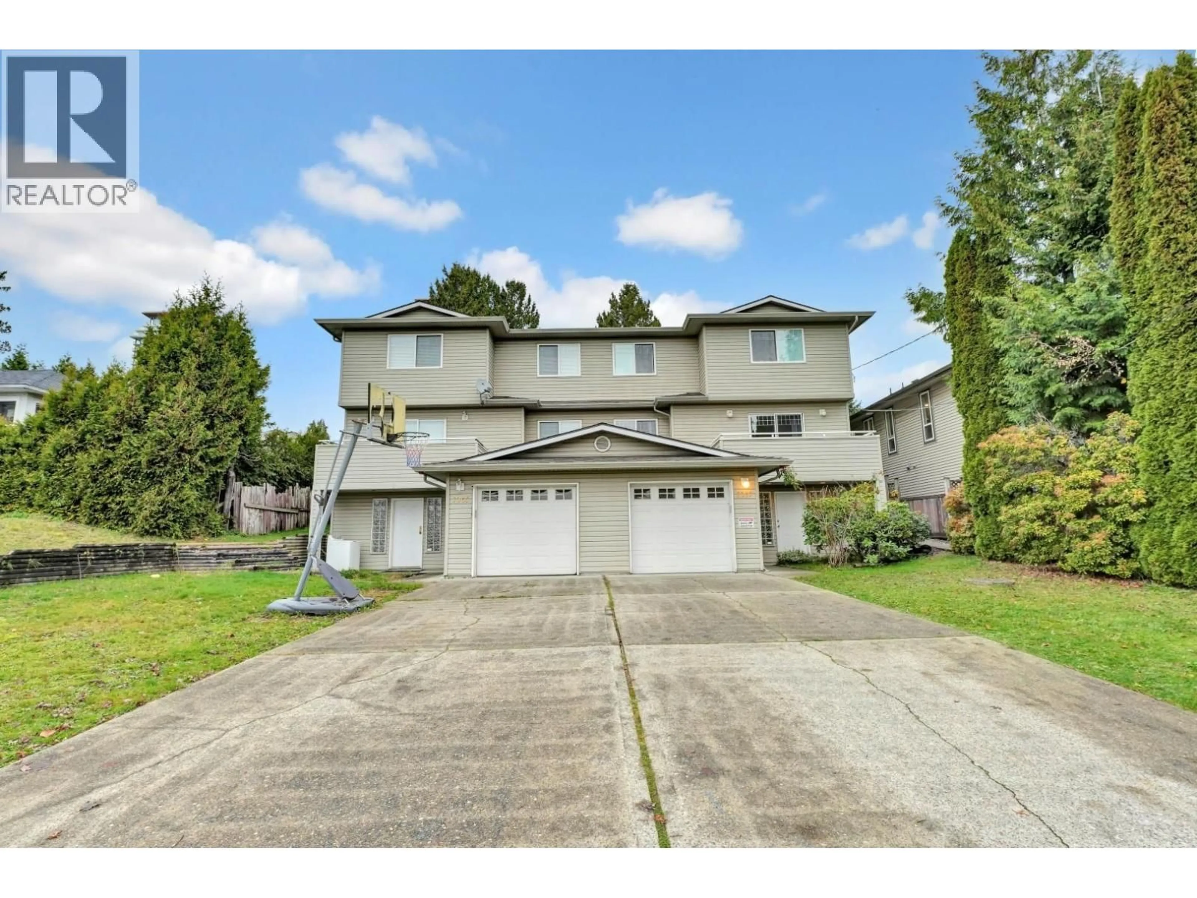 A pic from outside/outdoor area/front of a property/back of a property/a pic from drone, street for 1067 DANSEY AVENUE, Coquitlam British Columbia V3K3H2