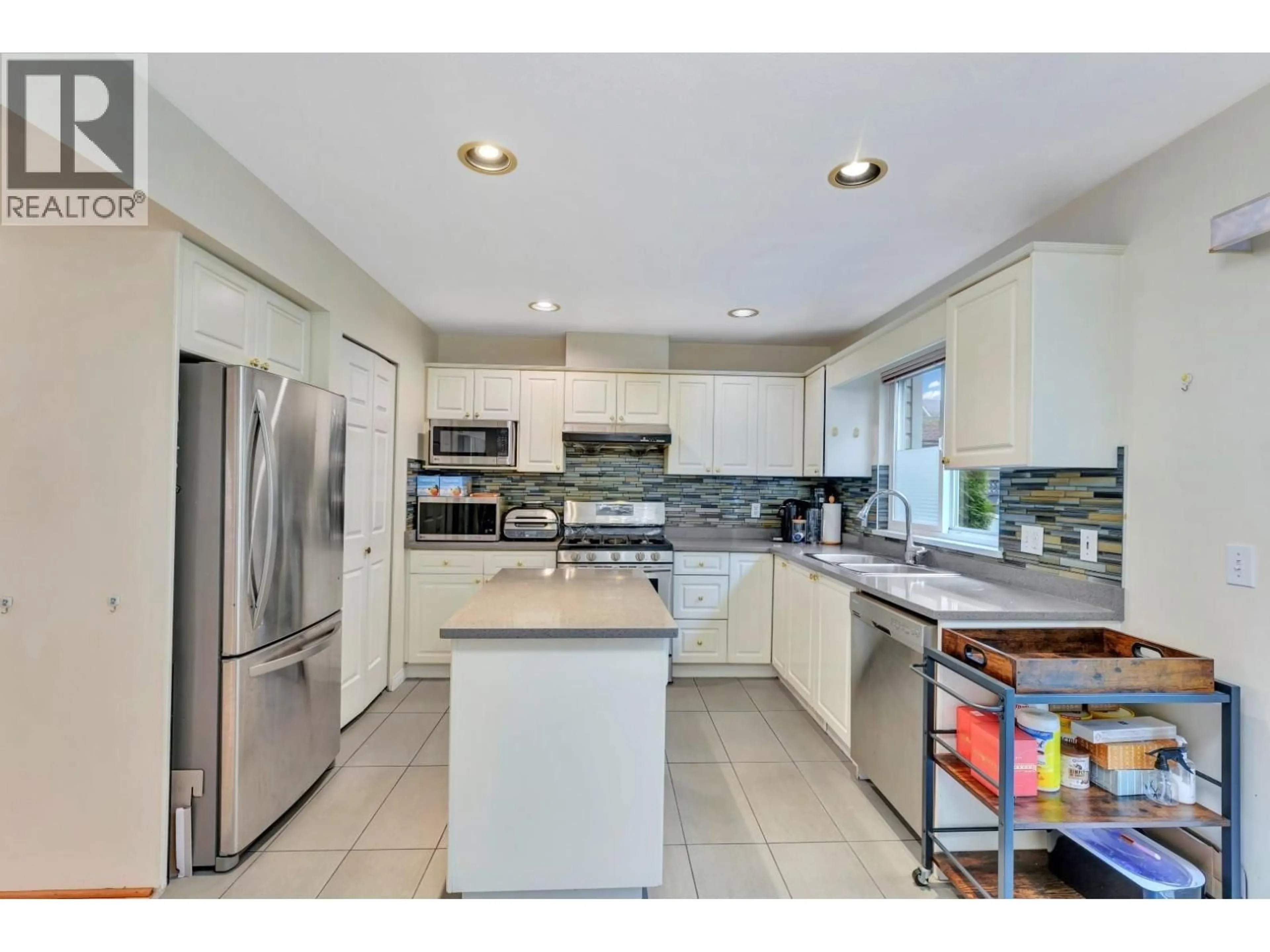 Open concept kitchen, ceramic/tile floor for 1067 DANSEY AVENUE, Coquitlam British Columbia V3K3H2