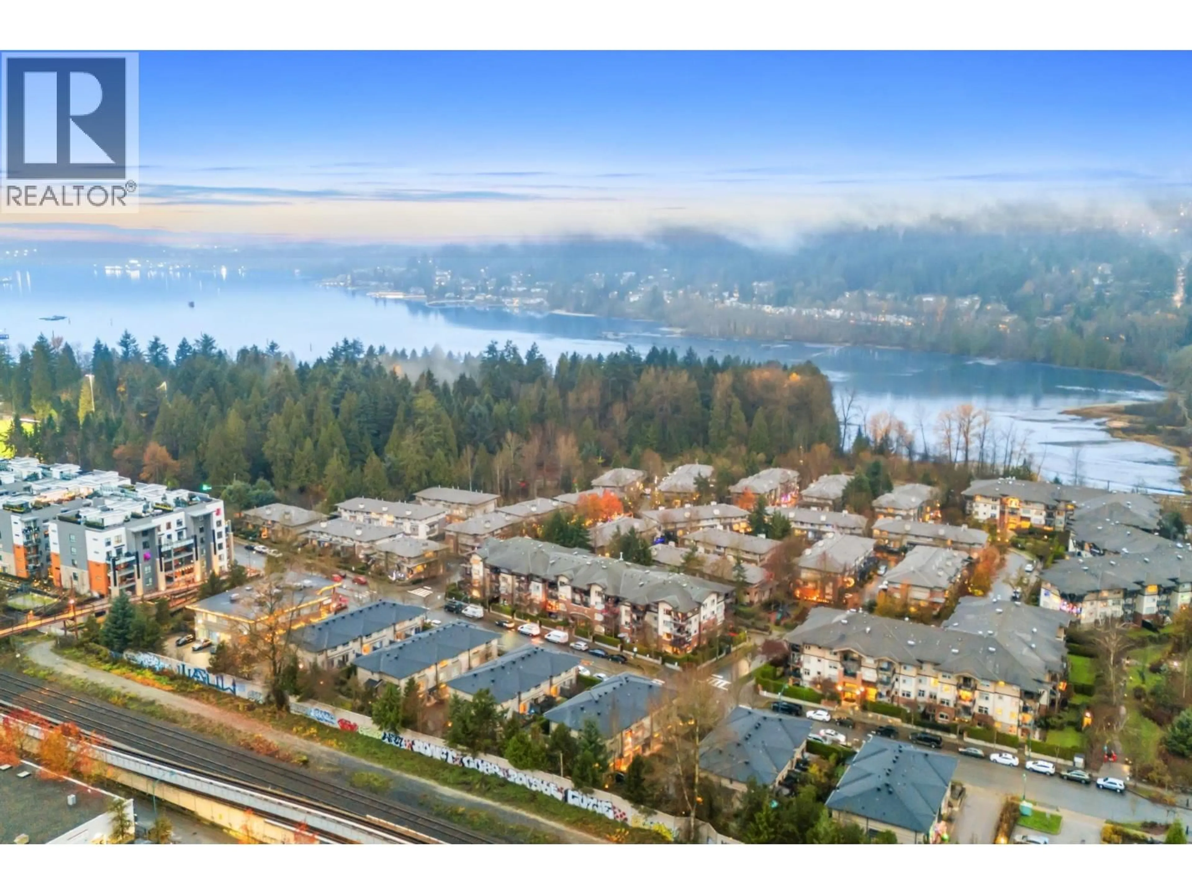 A pic from outside/outdoor area/front of a property/back of a property/a pic from drone, water/lake/river/ocean view for 208 - 200 KLAHANIE DRIVE, Port Moody British Columbia V3H5K7
